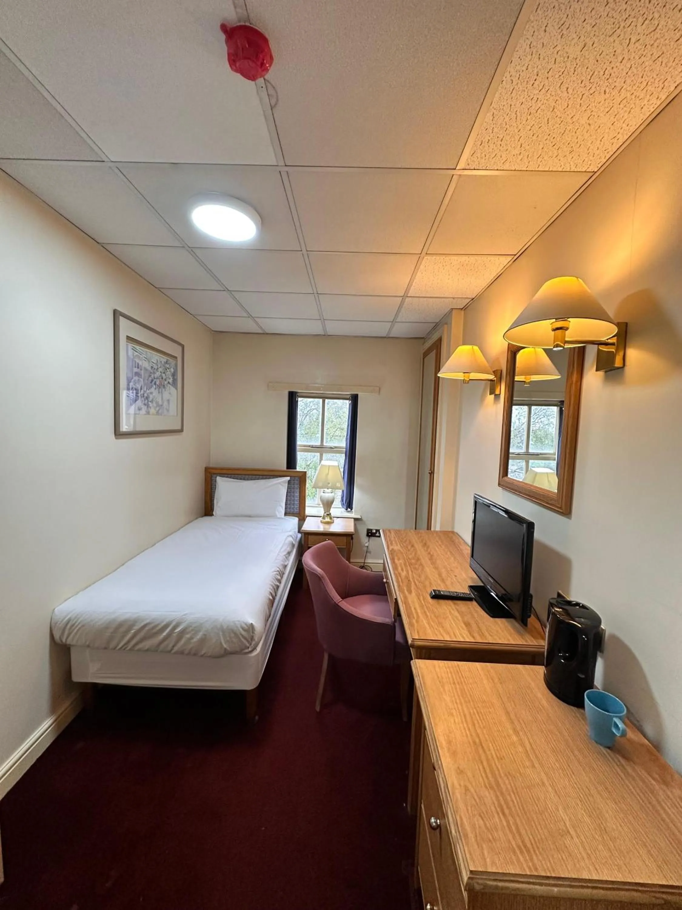 Bed in Throstles Nest Hotel