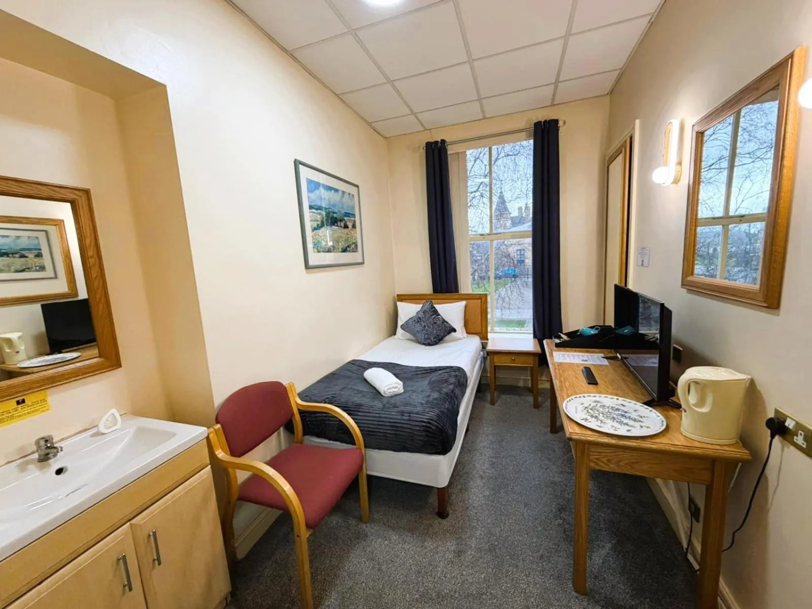 Bed in Throstles Nest Hotel