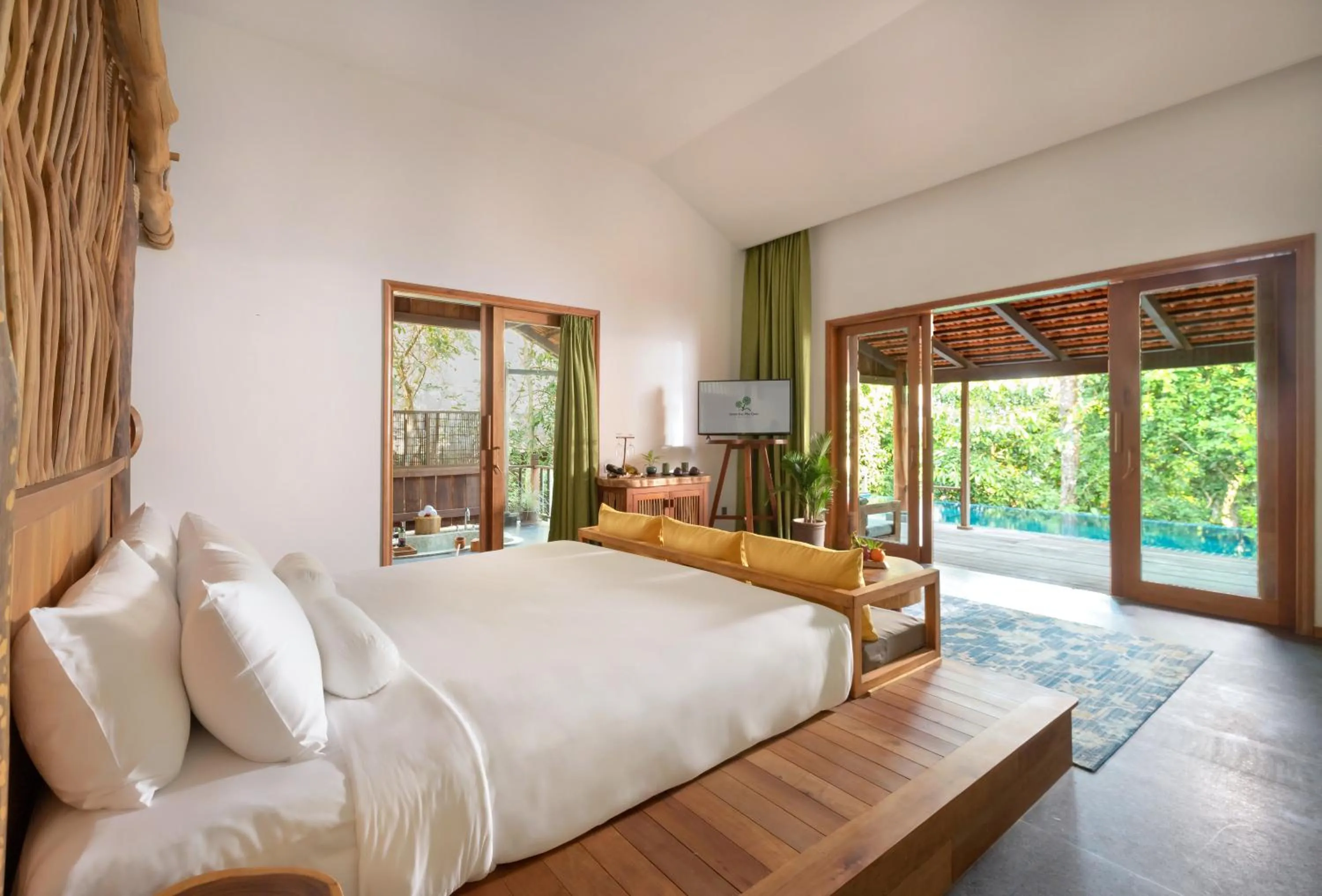 Bed in Green Bay Phu Quoc Resort & Spa