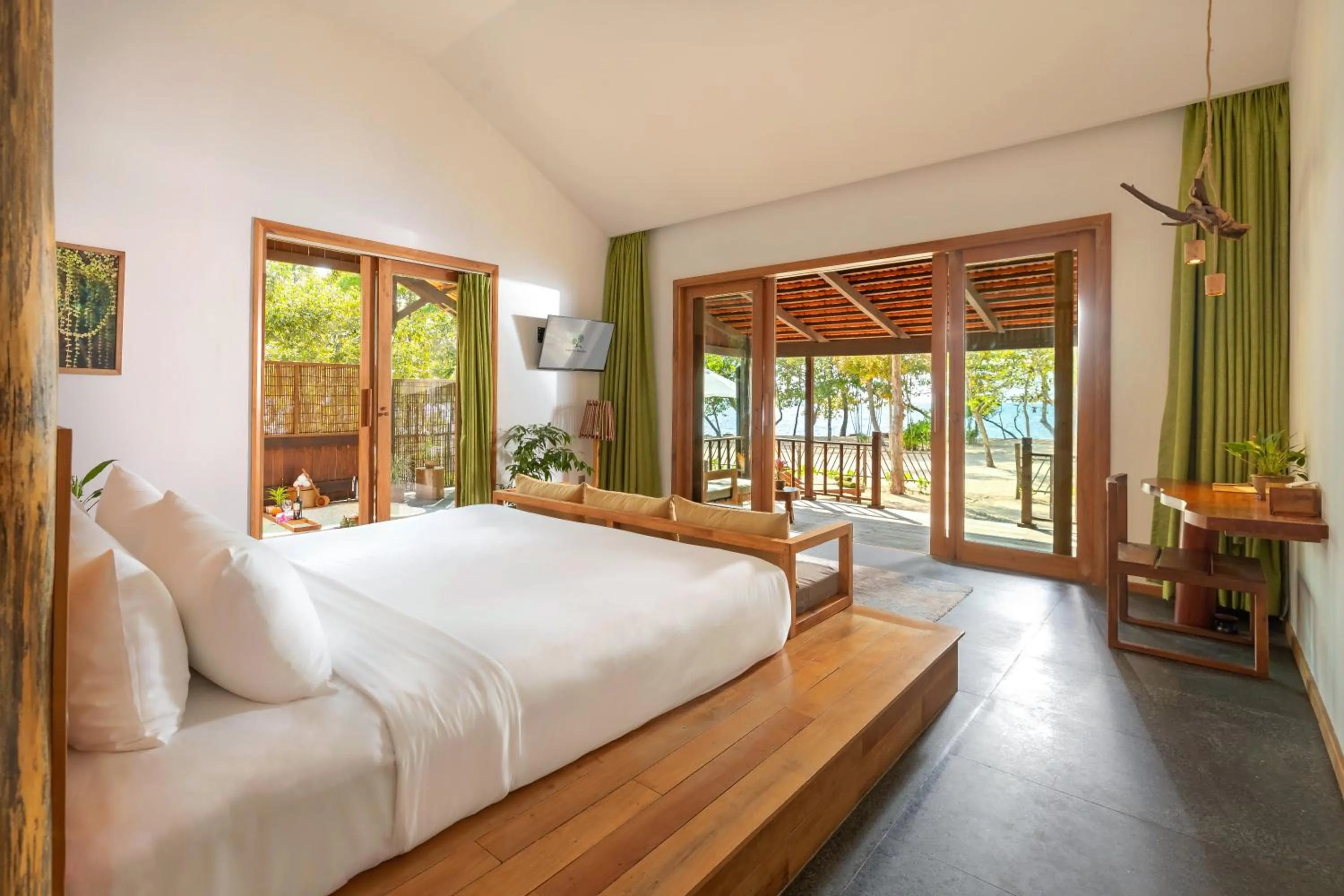 Bed in Green Bay Phu Quoc Resort & Spa