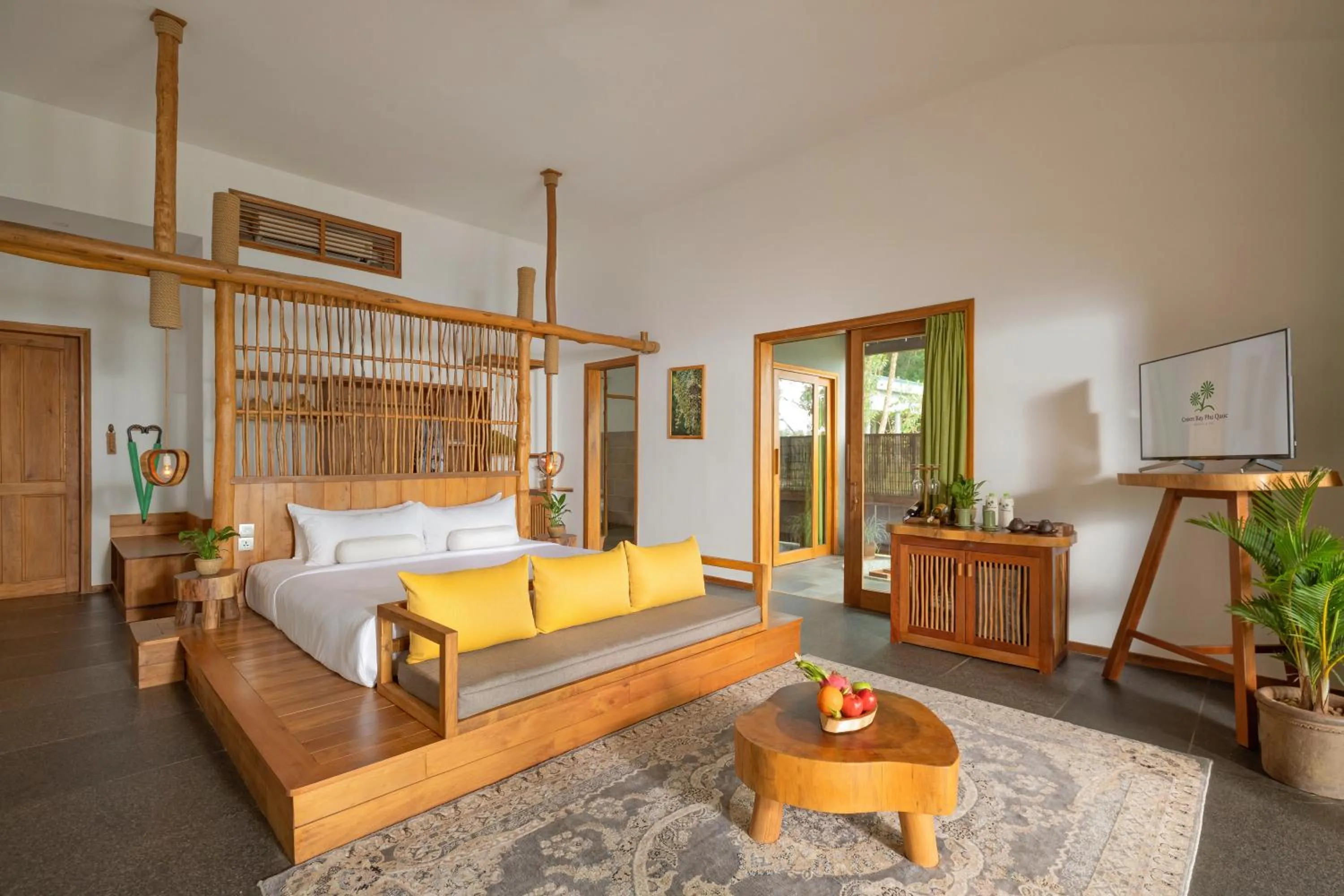 Communal lounge/ TV room, Bed in Green Bay Phu Quoc Resort & Spa