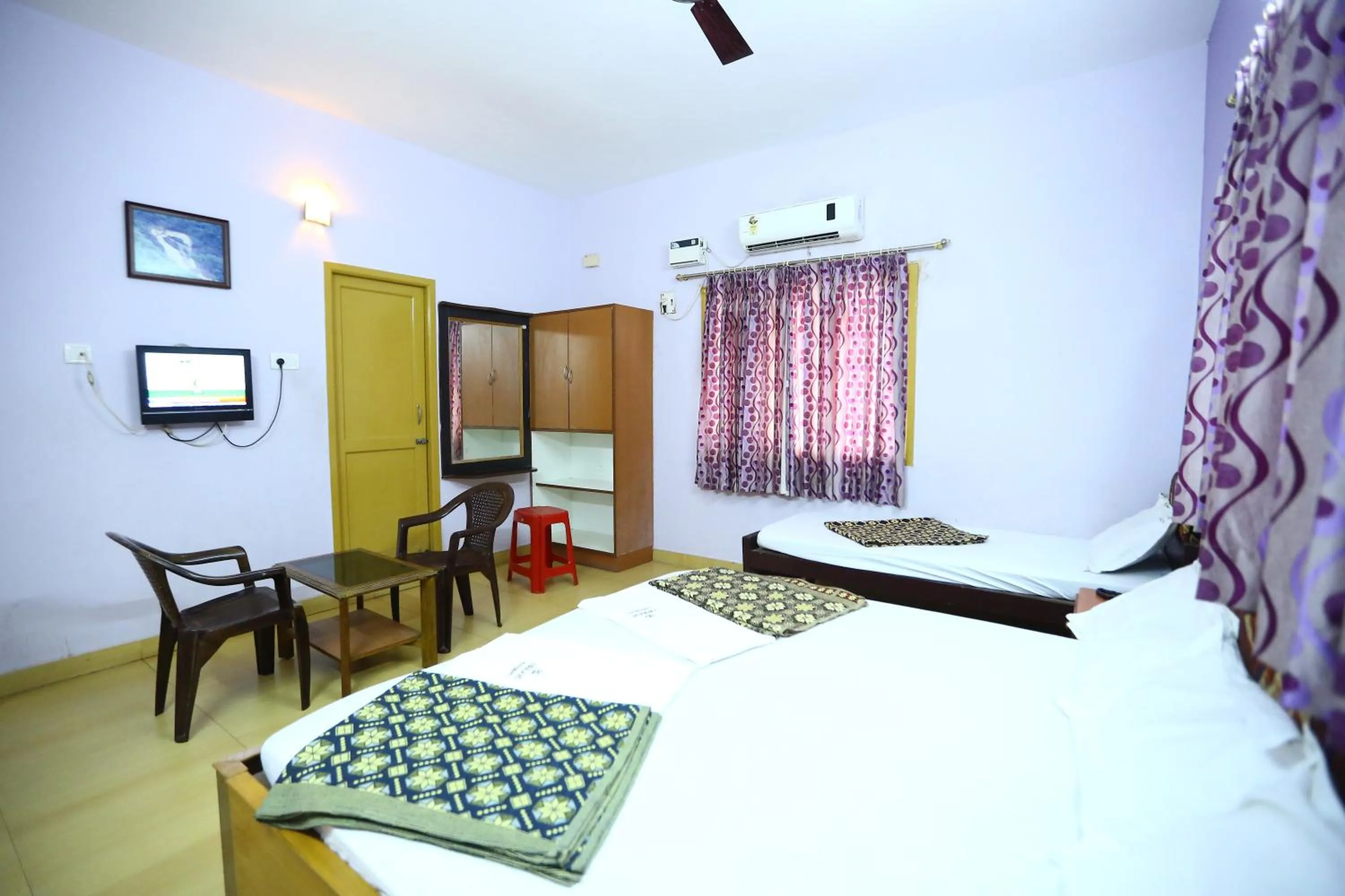 Bedroom, Bed in Abirami Residency