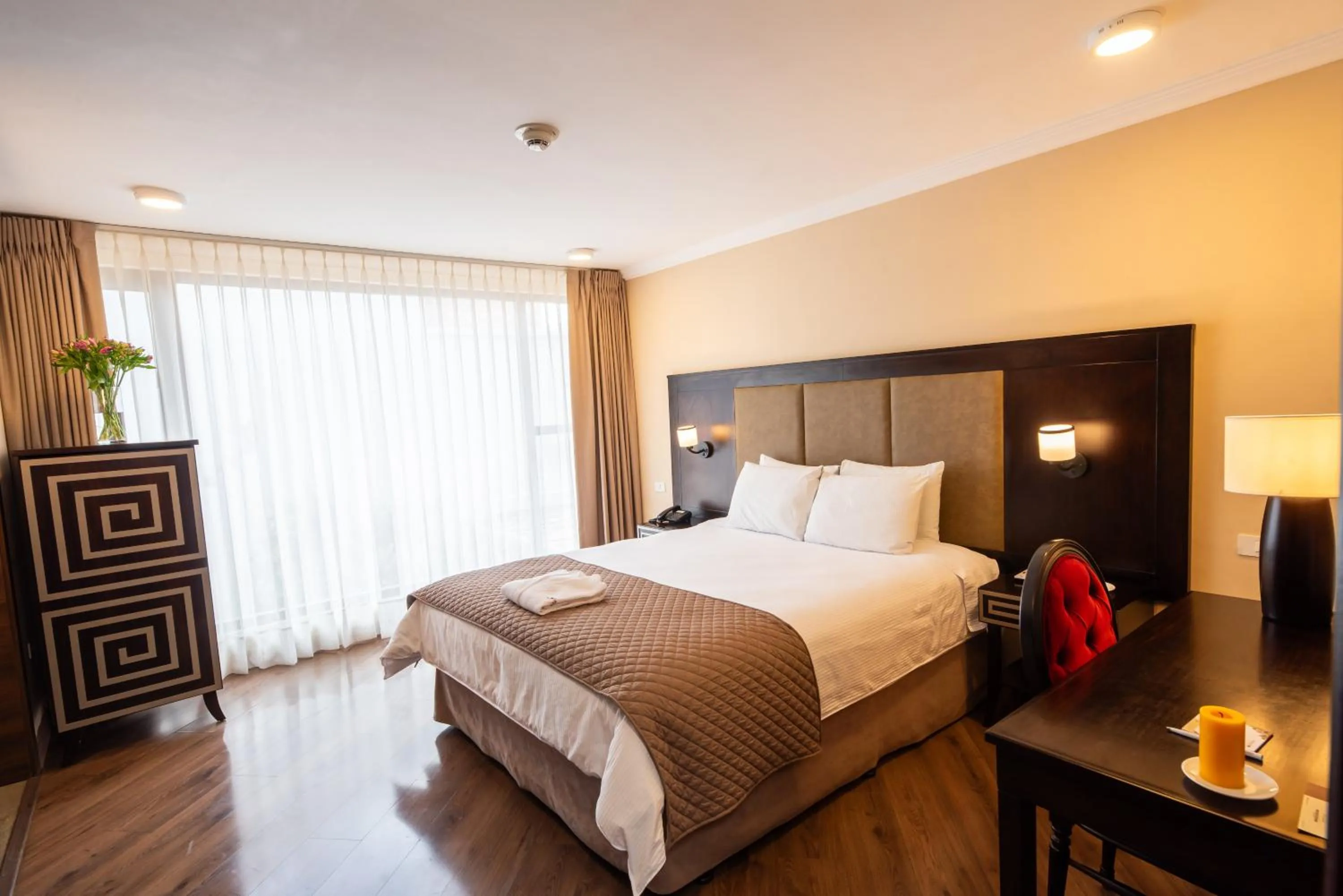 Bed in Quindeloma Art Hotel & Gallery