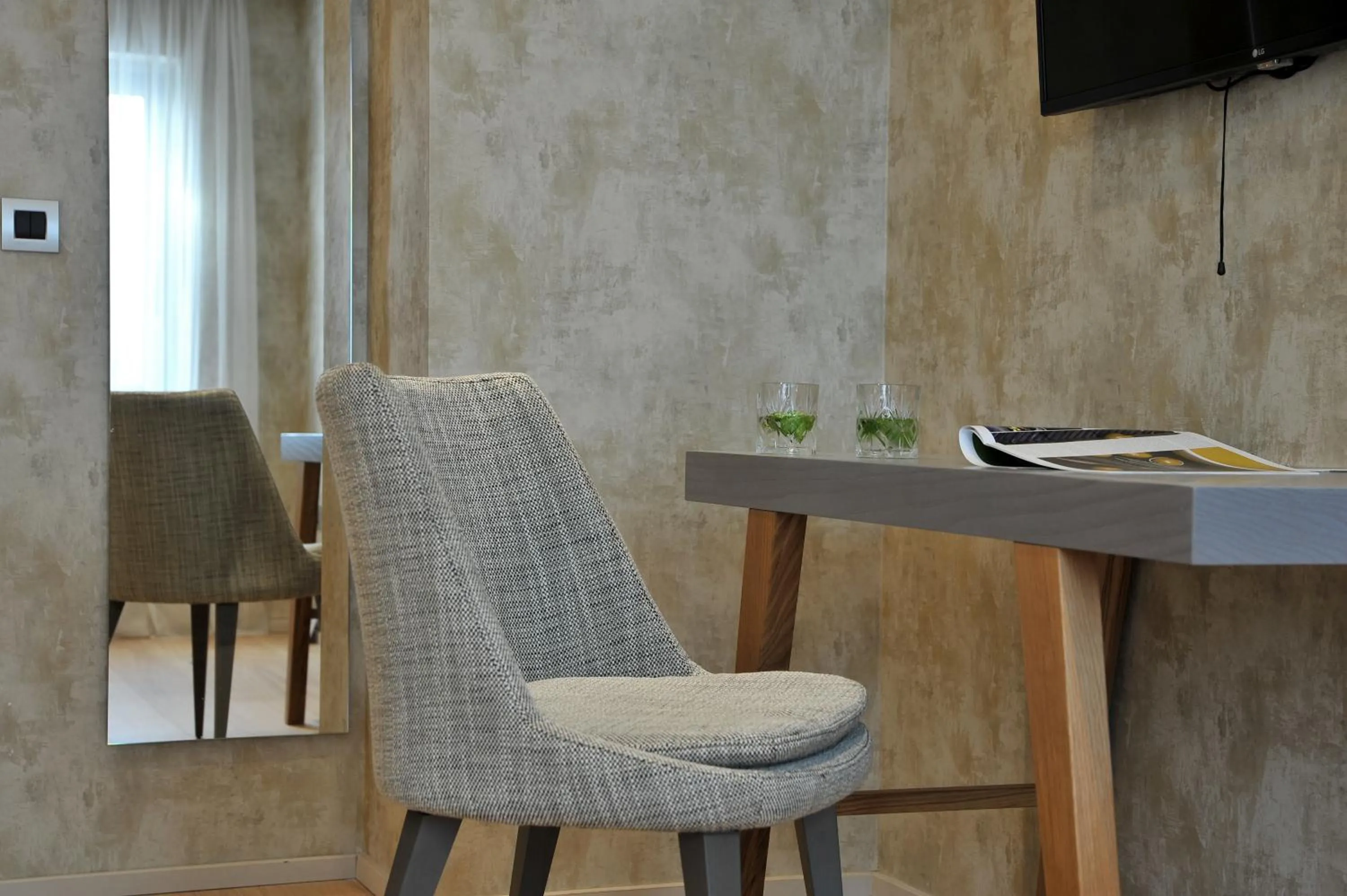 Seating area in Athenaeum Grand Hotel