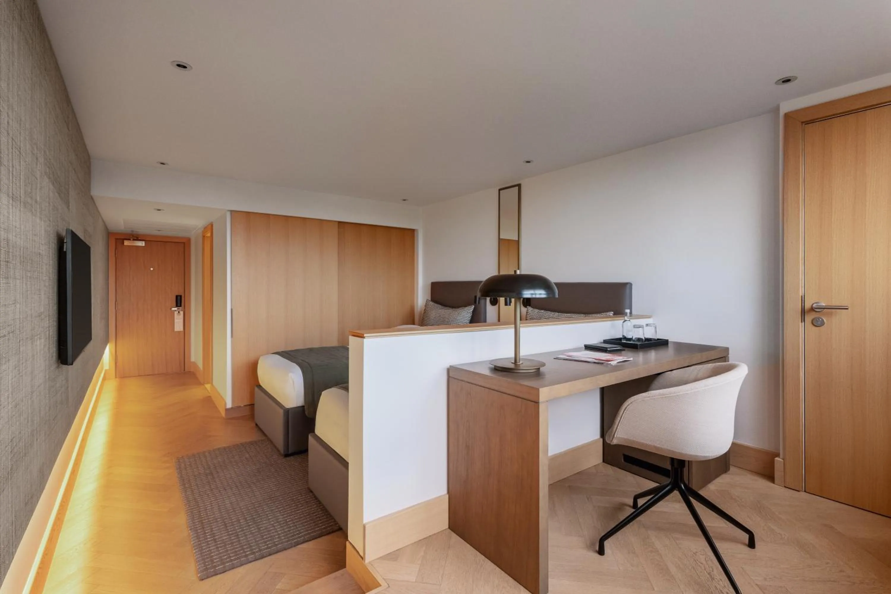 Bedroom in Royal Garden Hotel