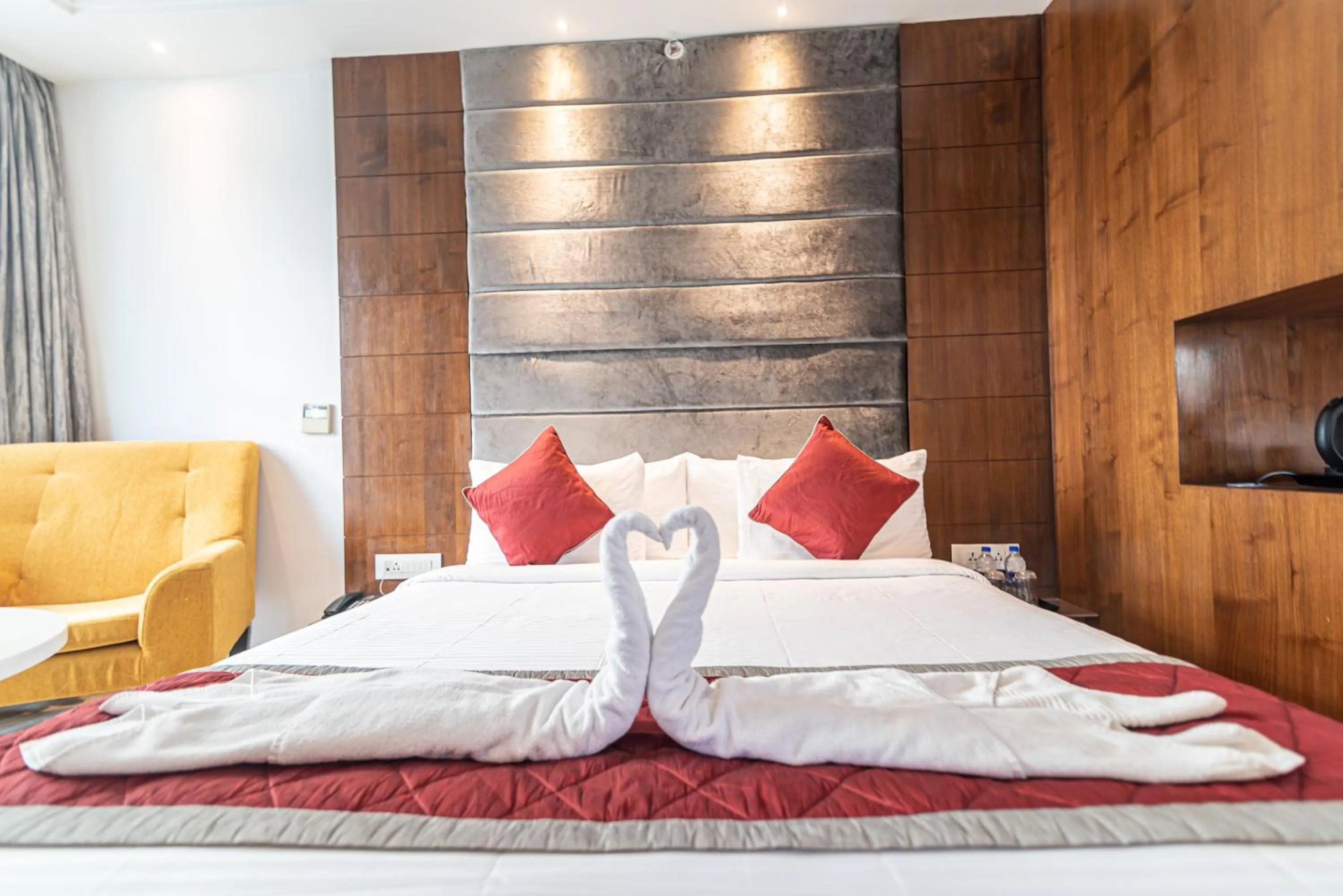 Bed in Bhagini Icon Premier Hotel