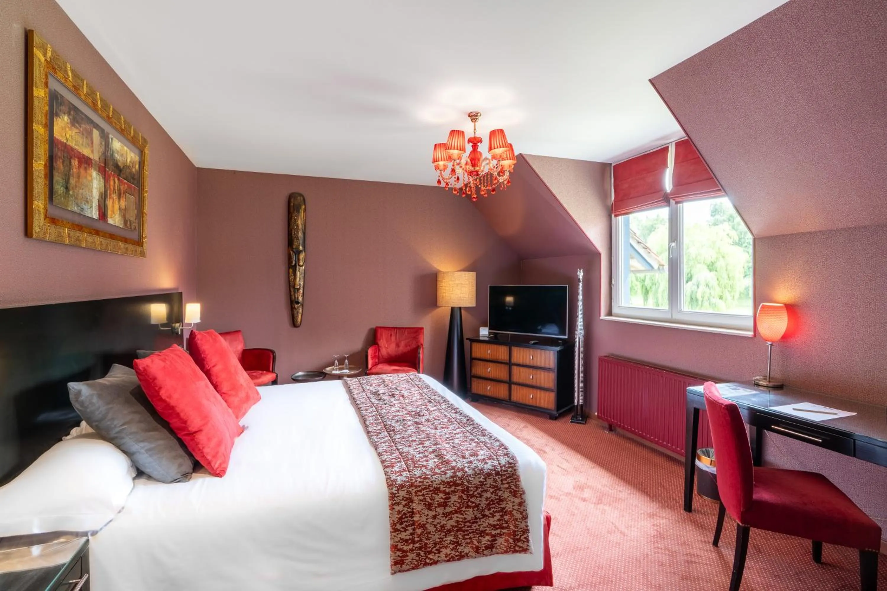 Bed in Le Manoir De La Poterie & Spa