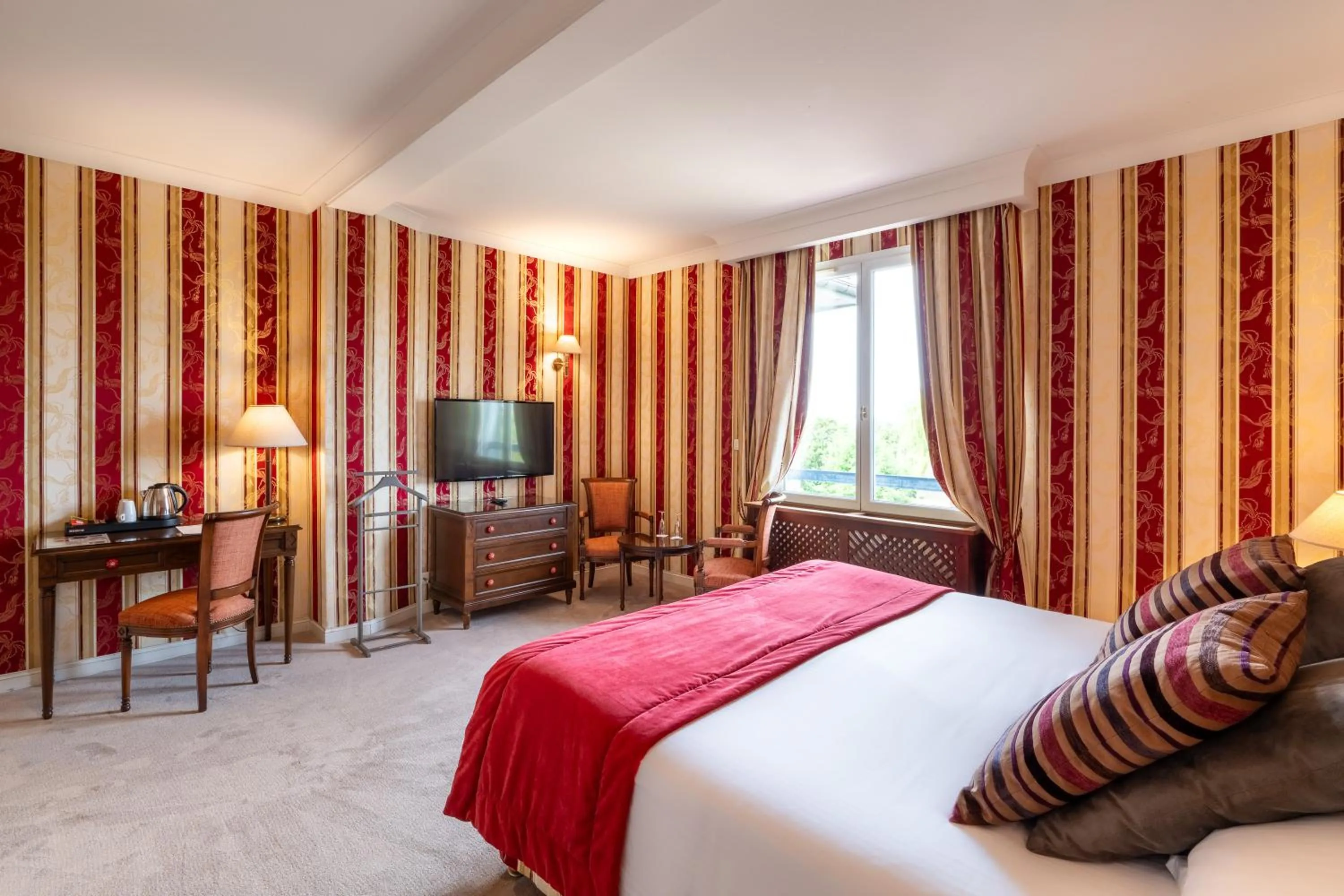 Bed in Le Manoir De La Poterie & Spa