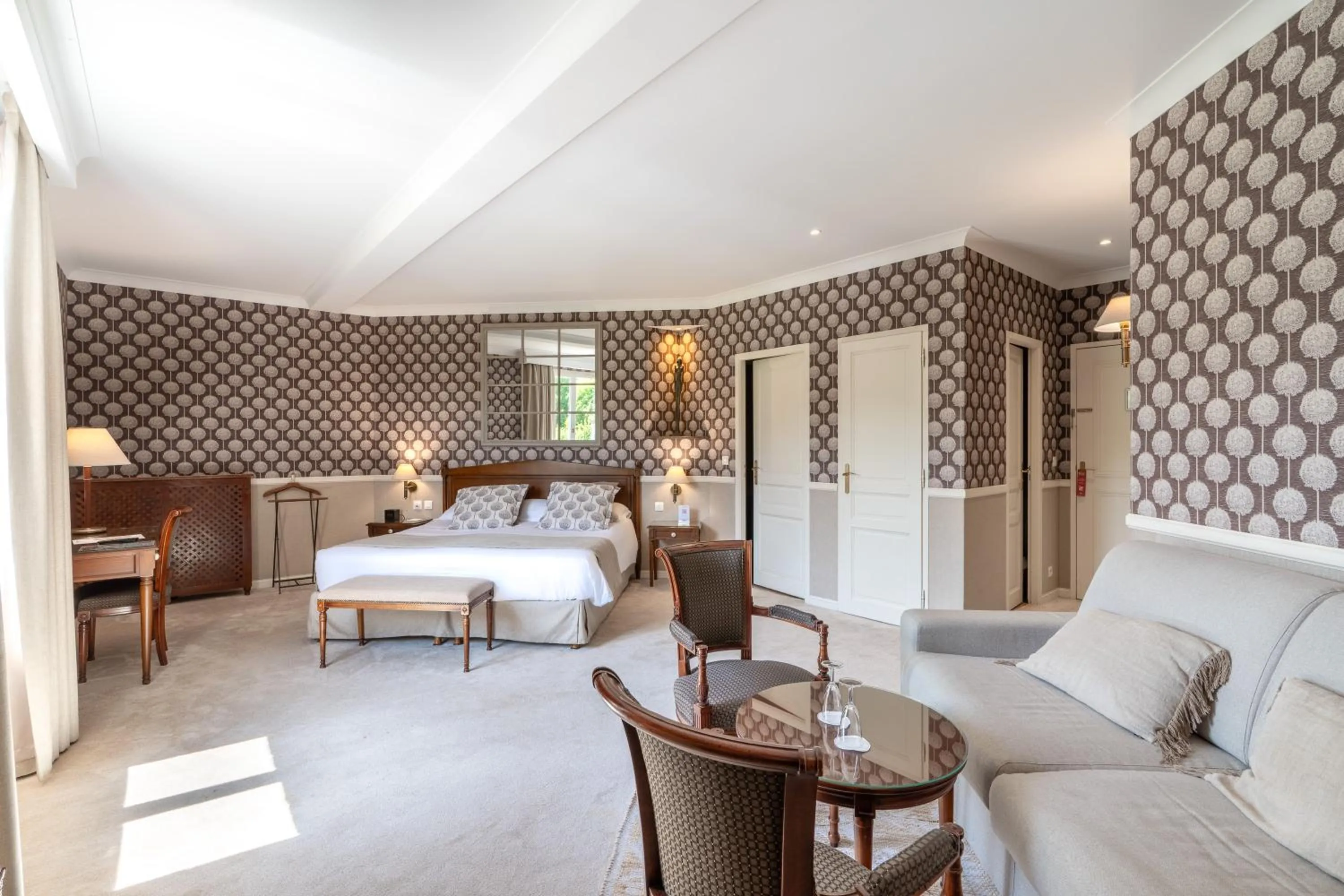 Bed in Le Manoir De La Poterie & Spa