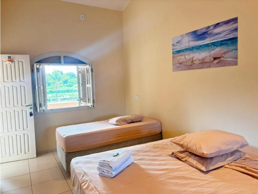 Bed in Pousada Porto do Rio