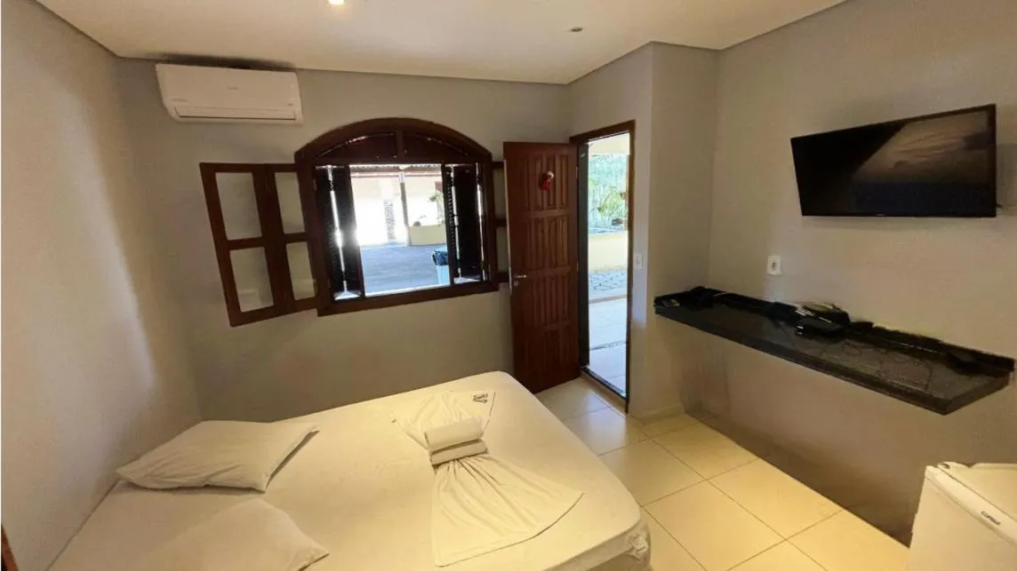 Bed in Pousada Porto do Rio