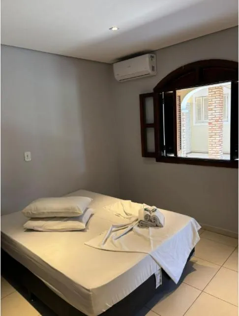 Bed in Pousada Porto do Rio