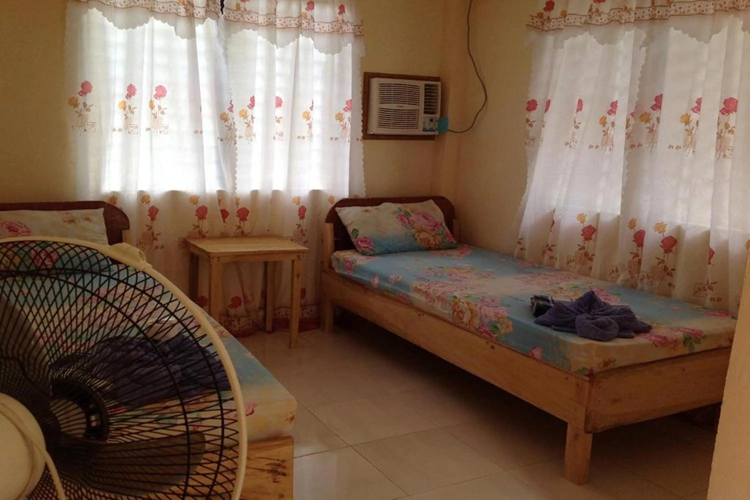 Photo of the whole room, Bed in Casa Paliton Siquijor near Beach