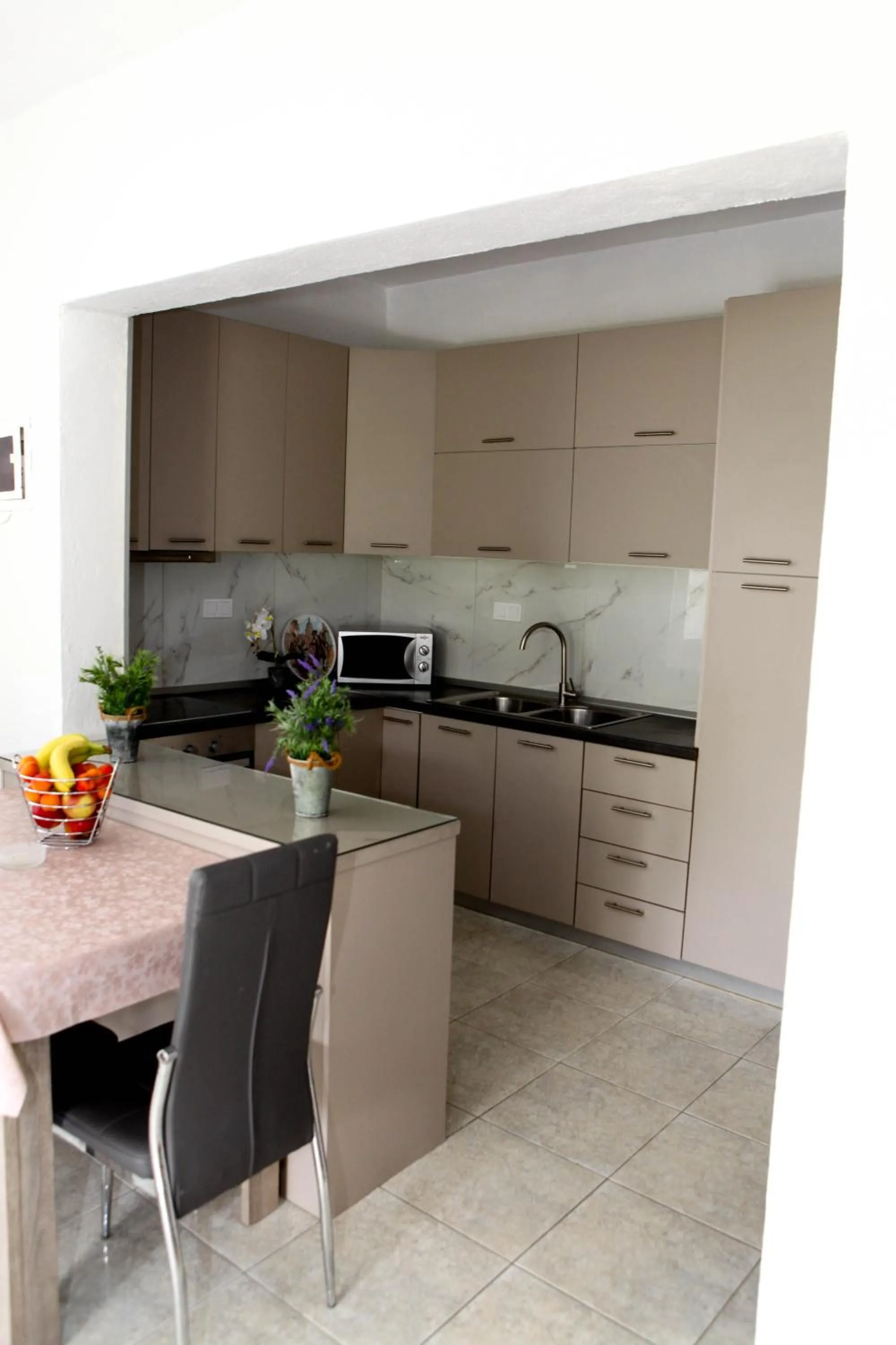 Kitchen or kitchenette in Nicole Fresh Apartments