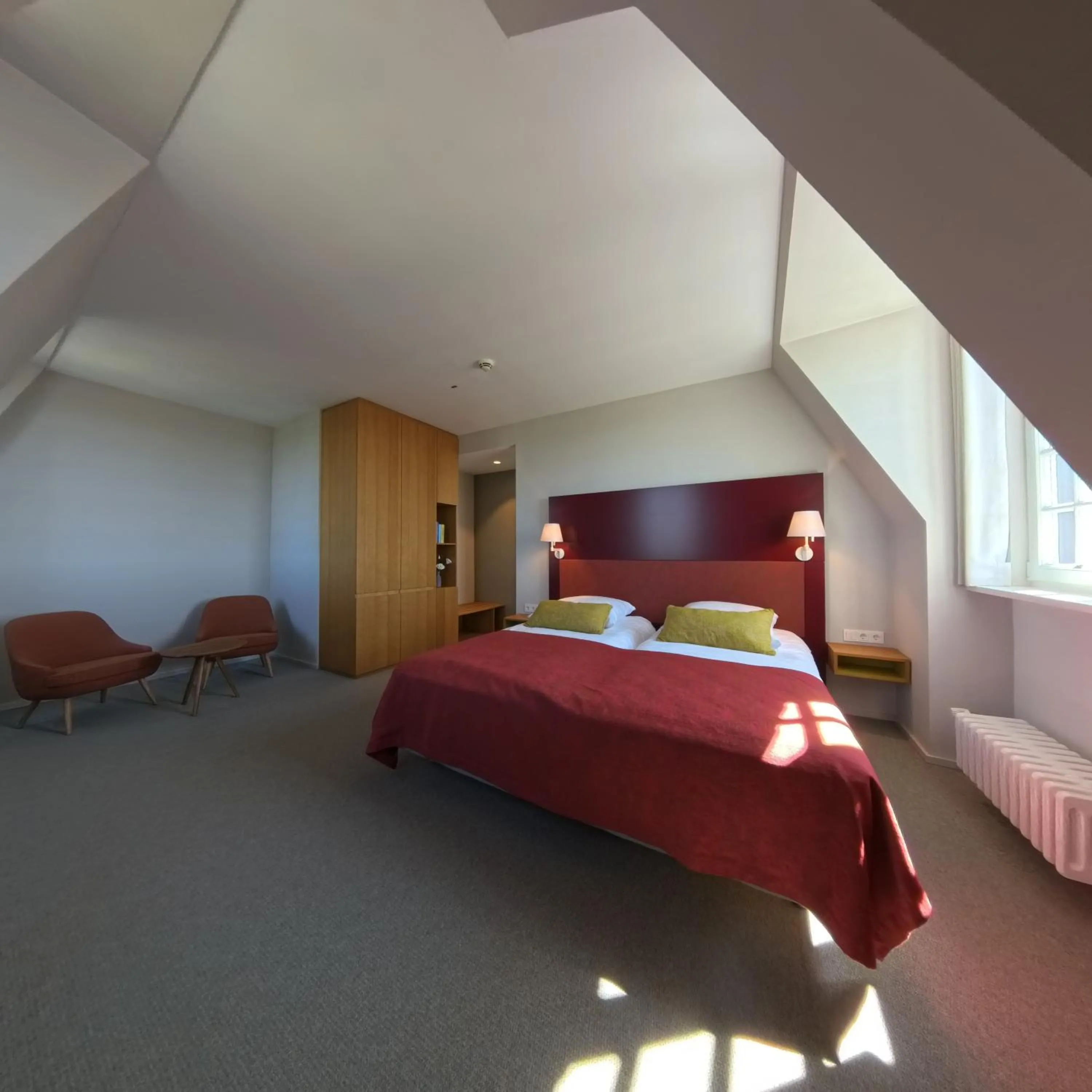 Photo of the whole room, Bed in Katholisch-Soziales Institut