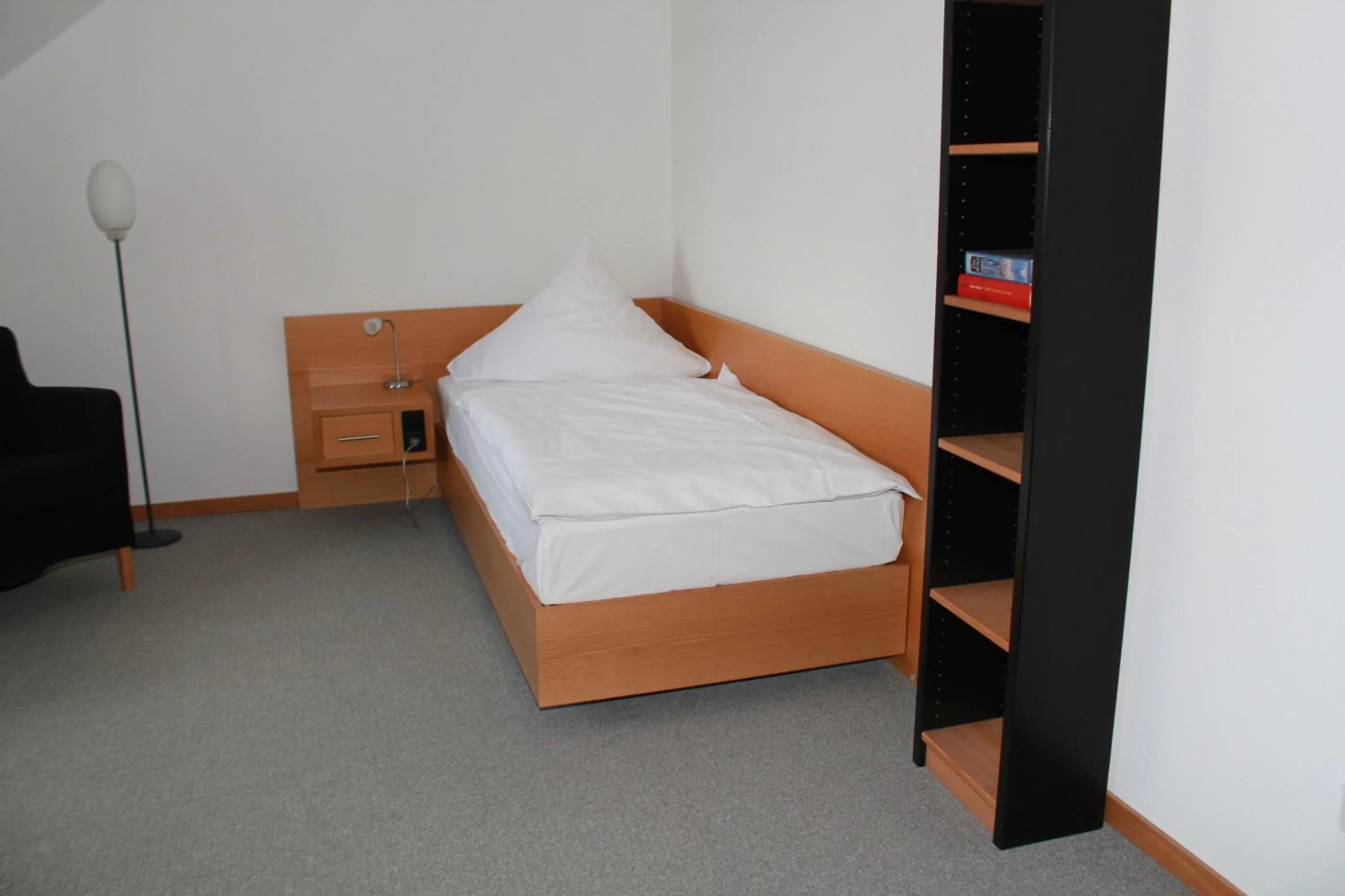 Photo of the whole room, Bed in Katholisch-Soziales Institut