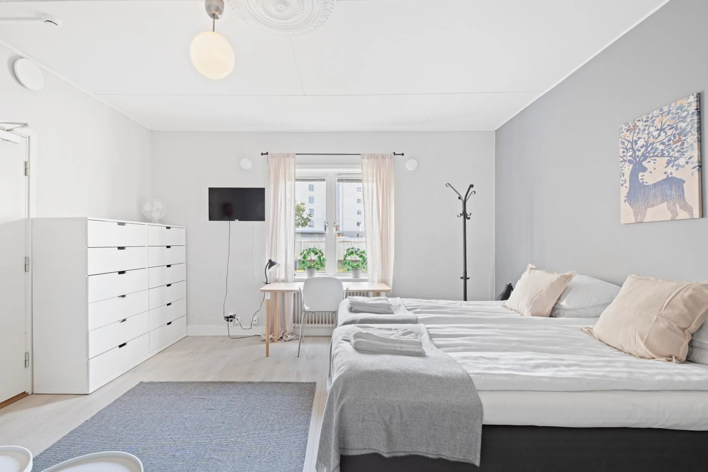 Bed in Uppsala Lägenhetshotell