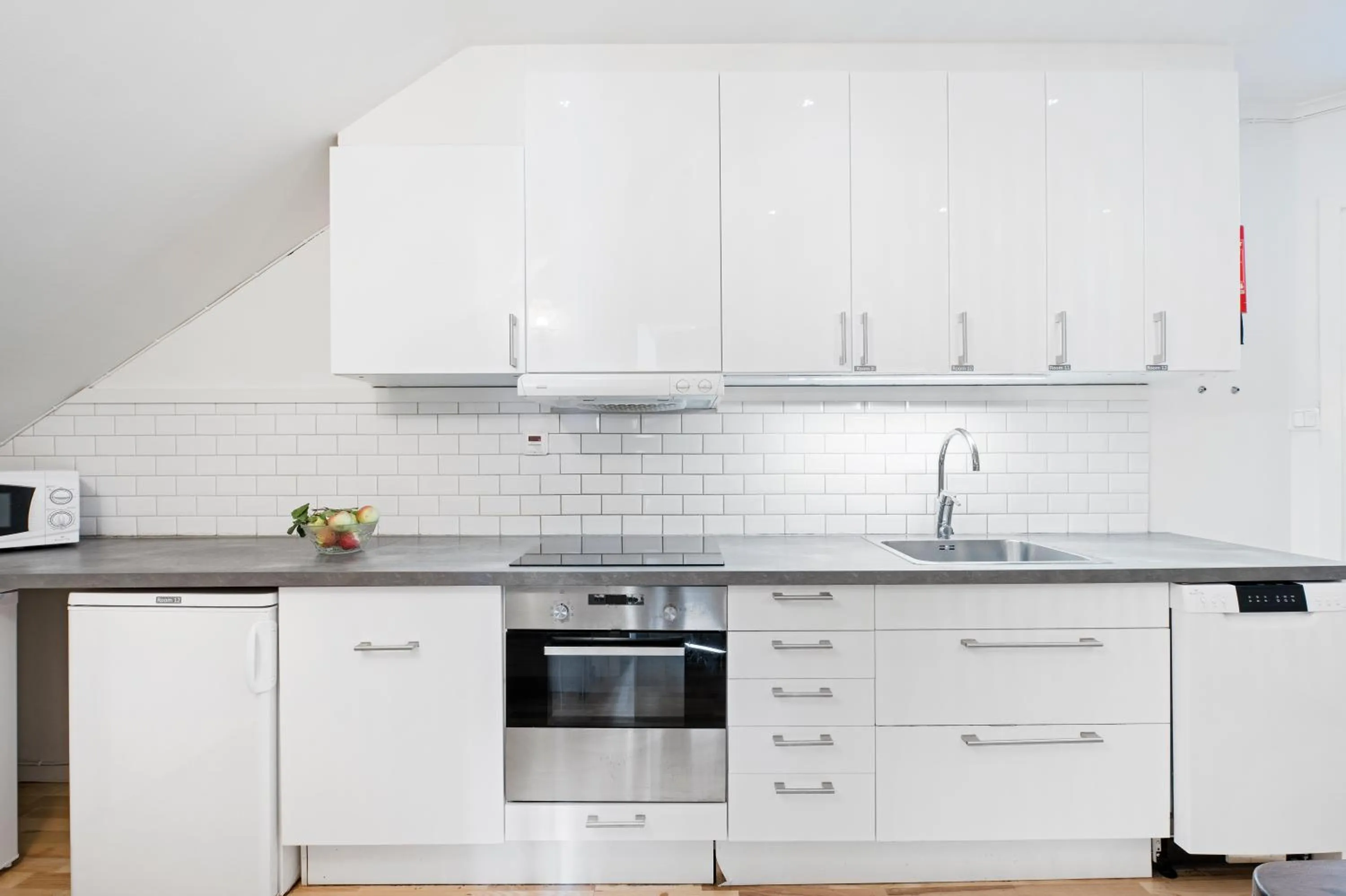 Communal kitchen in Uppsala Lägenhetshotell