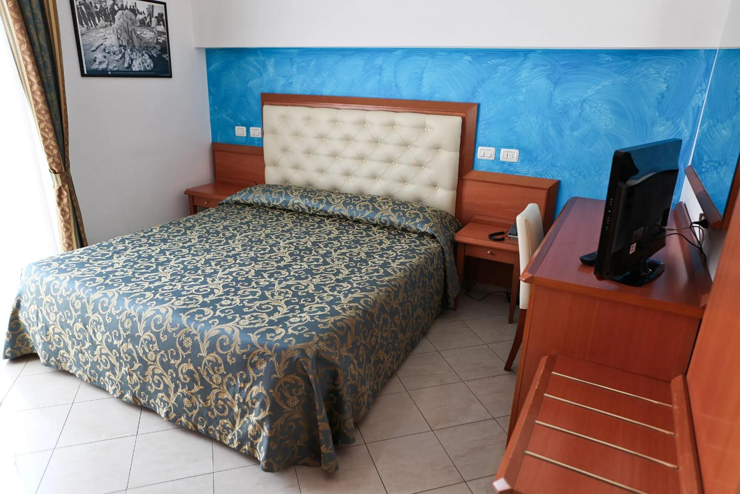 Photo of the whole room, Bed in Hotel Gabbiano