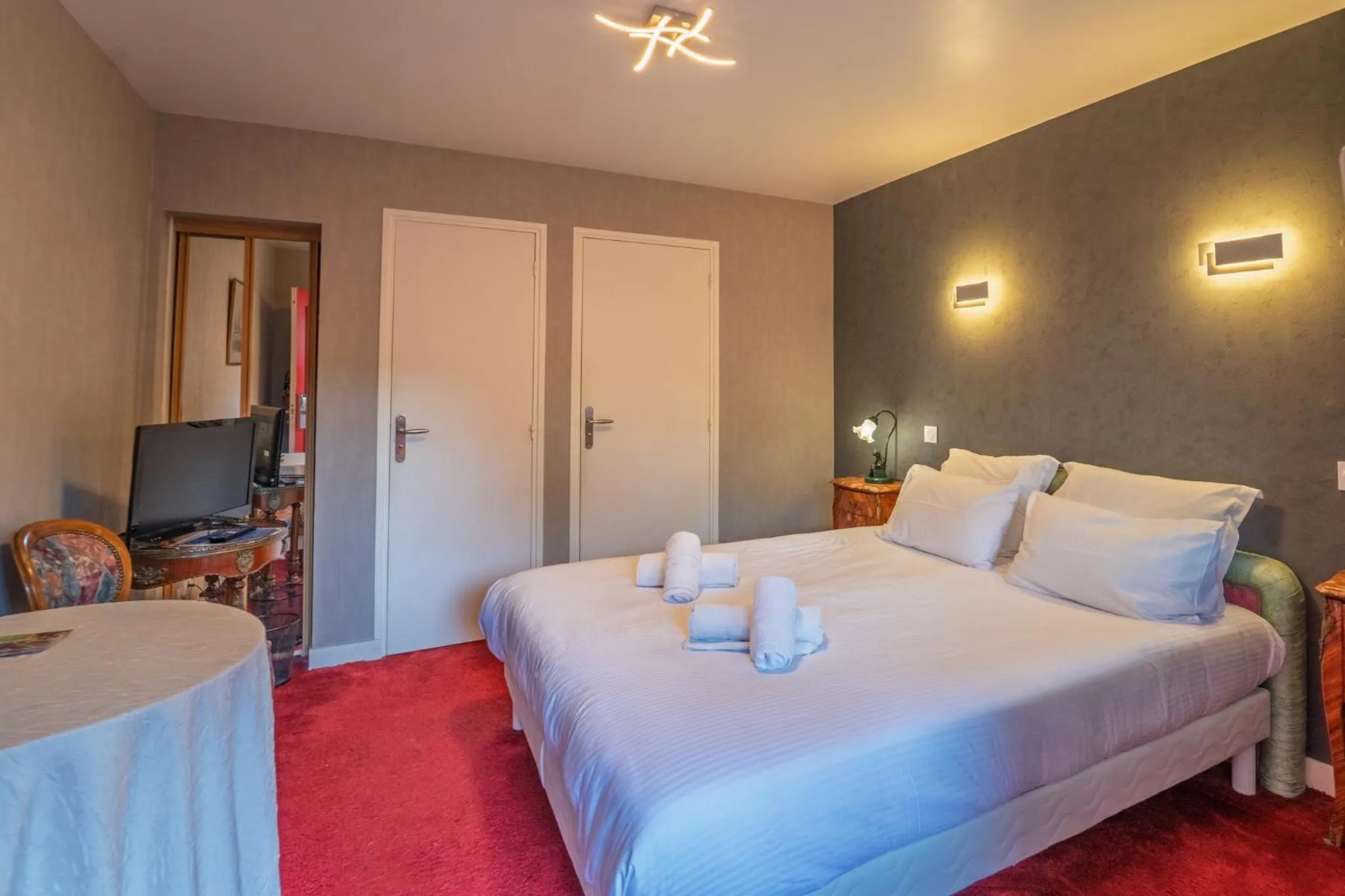 Bed in Hotel La Diligence