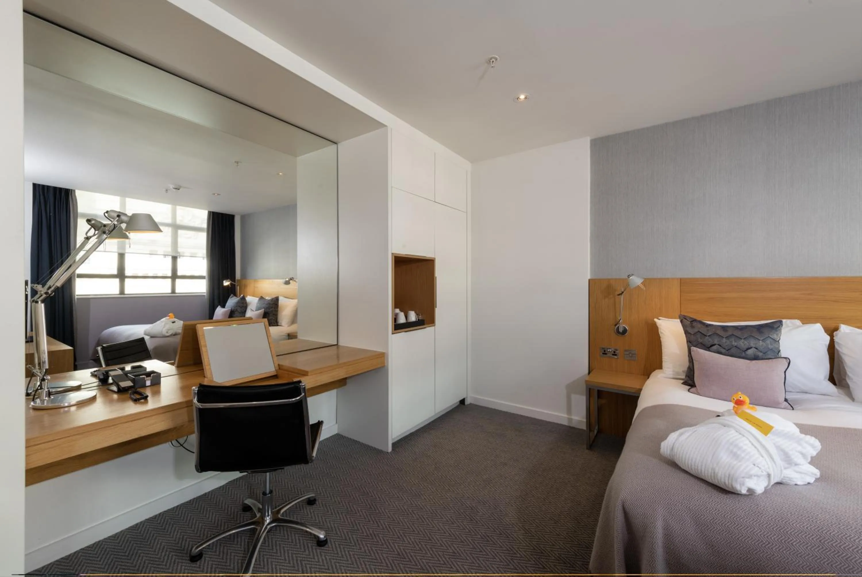 Bed in Apex City Of London Hotel