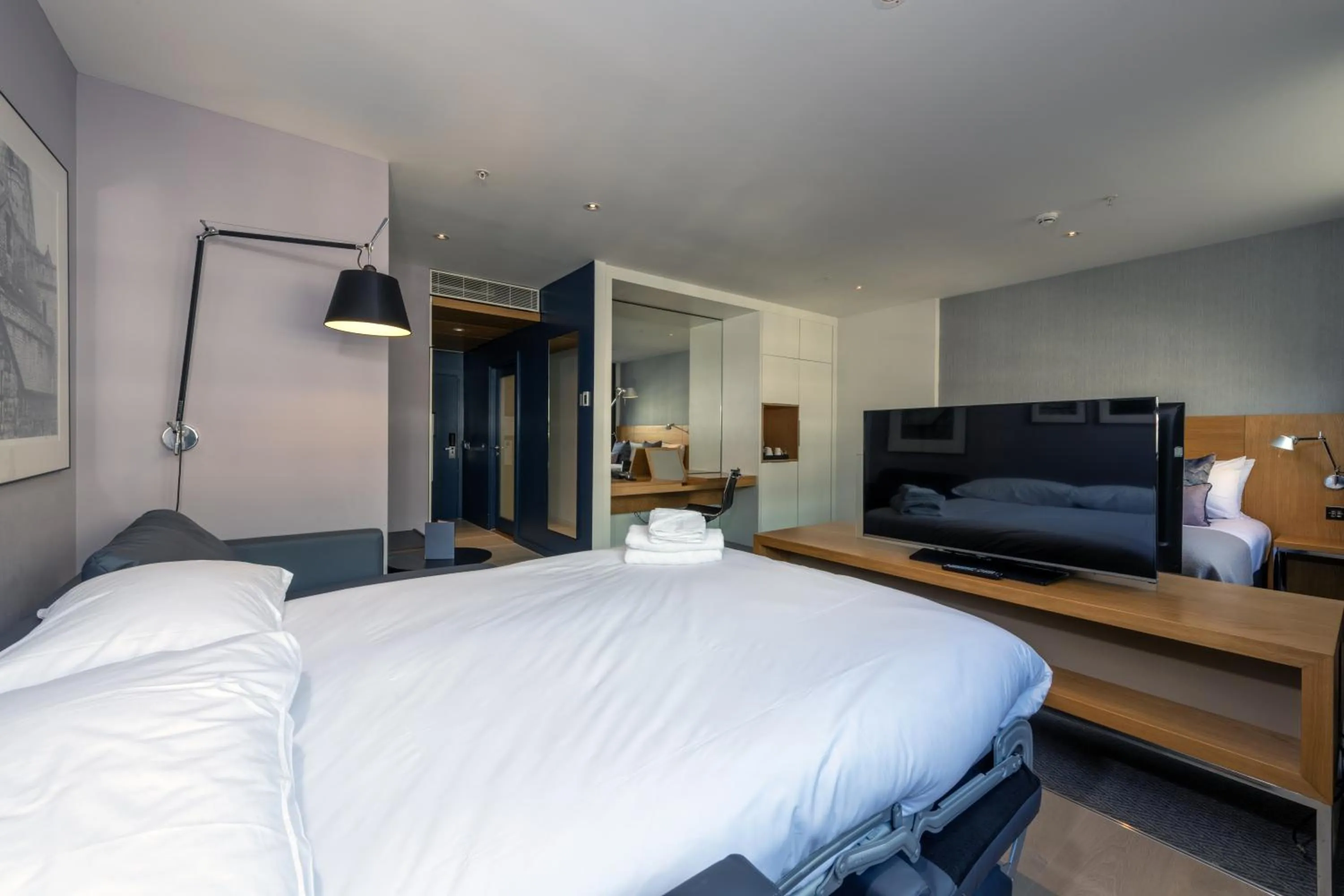 Bed in Apex City Of London Hotel