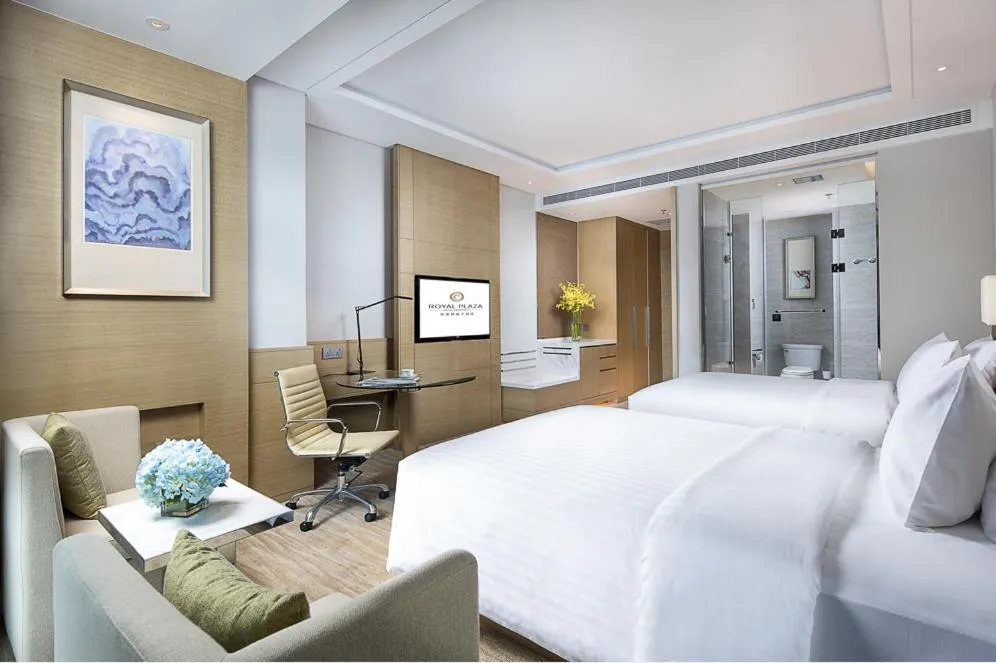 Bed in Jinan Inzone Royal Plaza Hotels