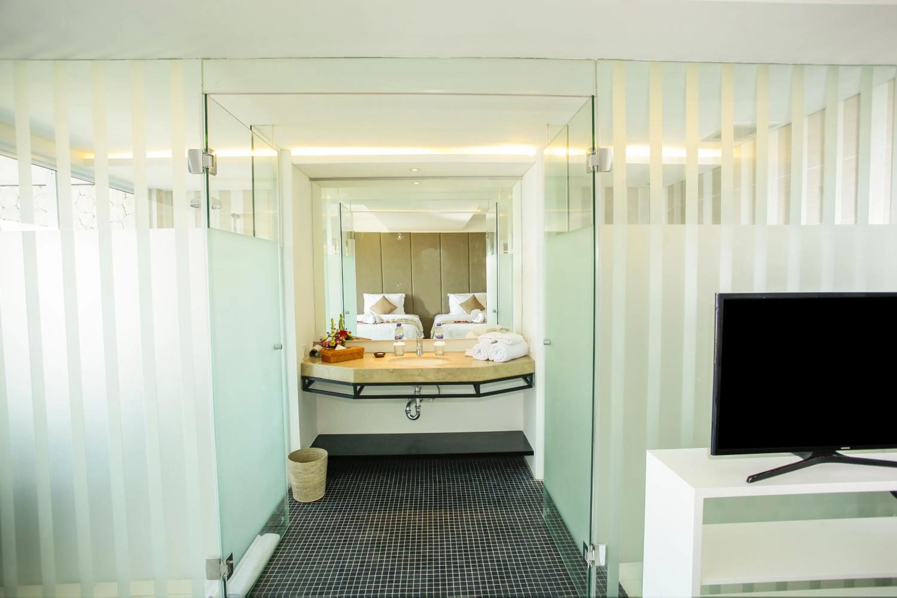 Bathroom, Bed in Benoa Sea Suites and Villas