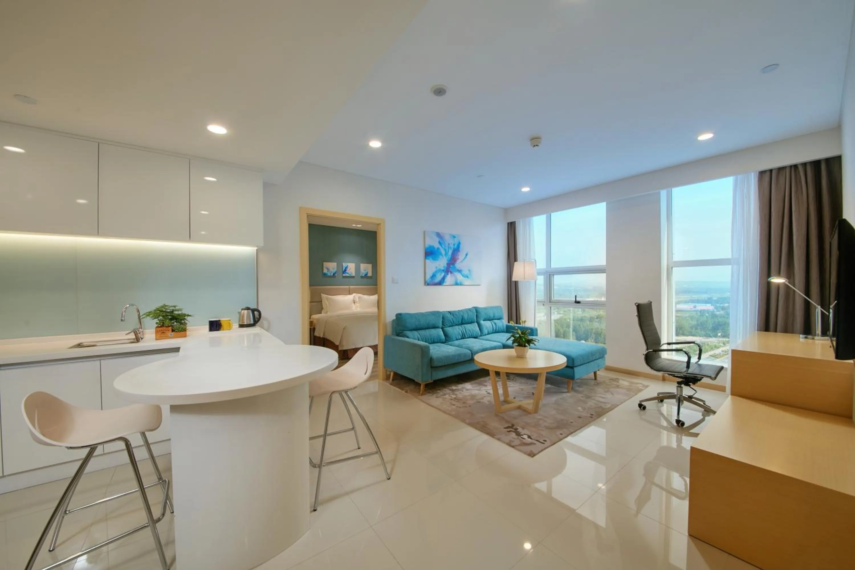 Living room in Holiday Inn Express Luoyang Yichuan by IHG