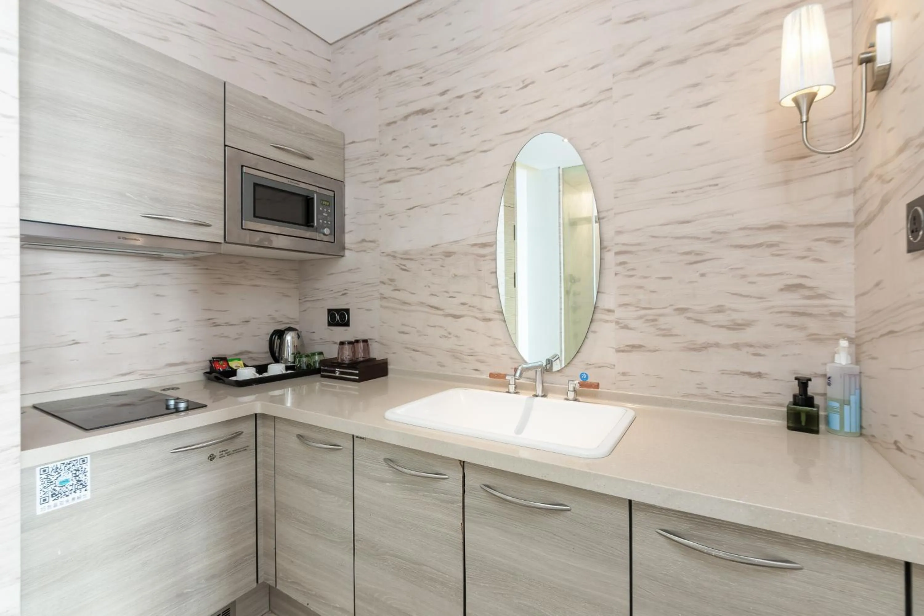 Kitchen or kitchenette in Sanya Phoenix Island Yuejia flat