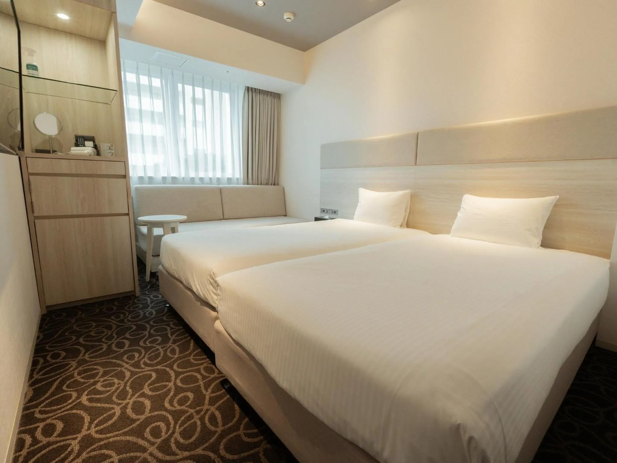 Photo of the whole room, Bed in Hotel Aqua Citta Naha