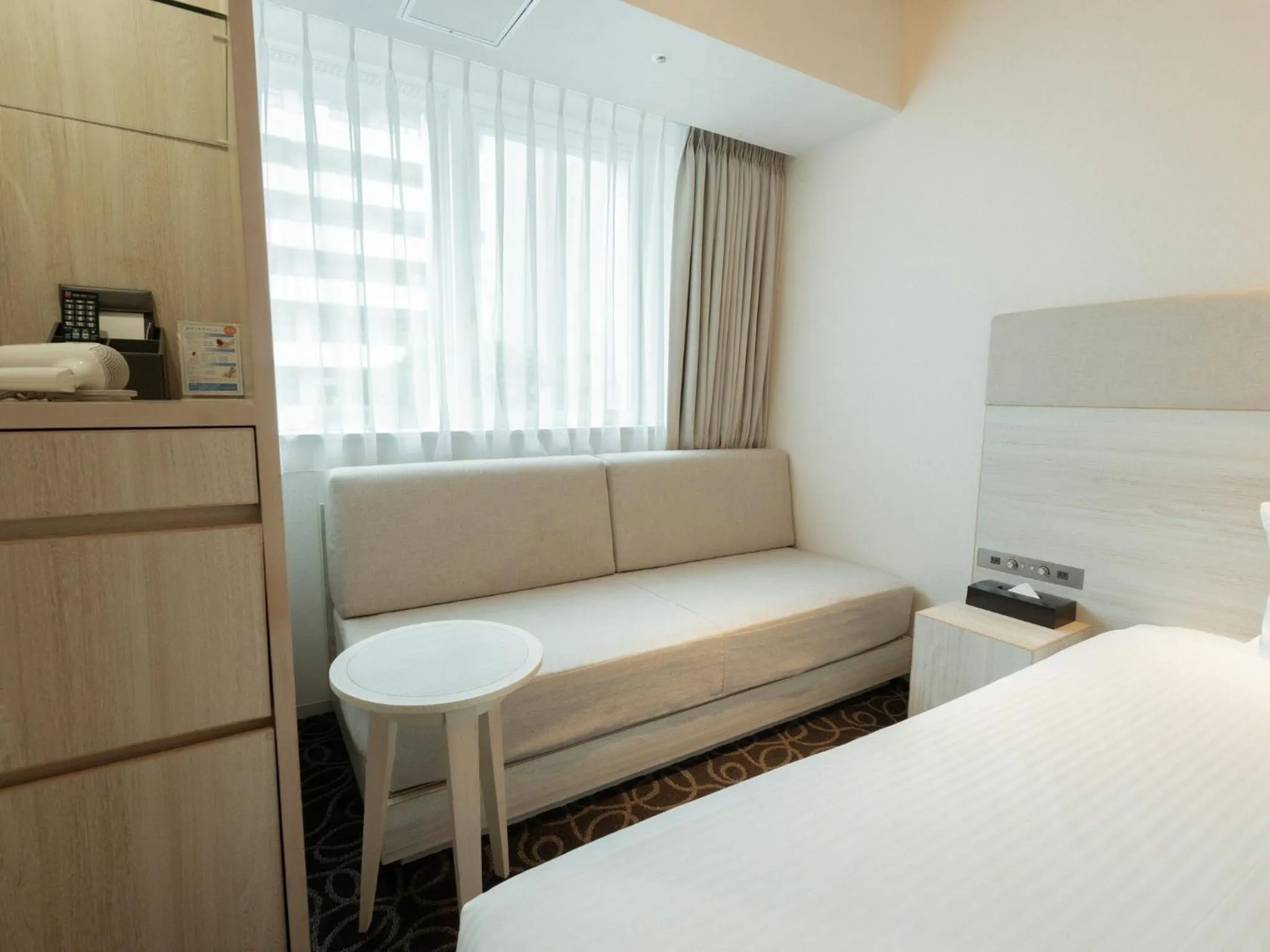 Photo of the whole room, Bed in Hotel Aqua Citta Naha