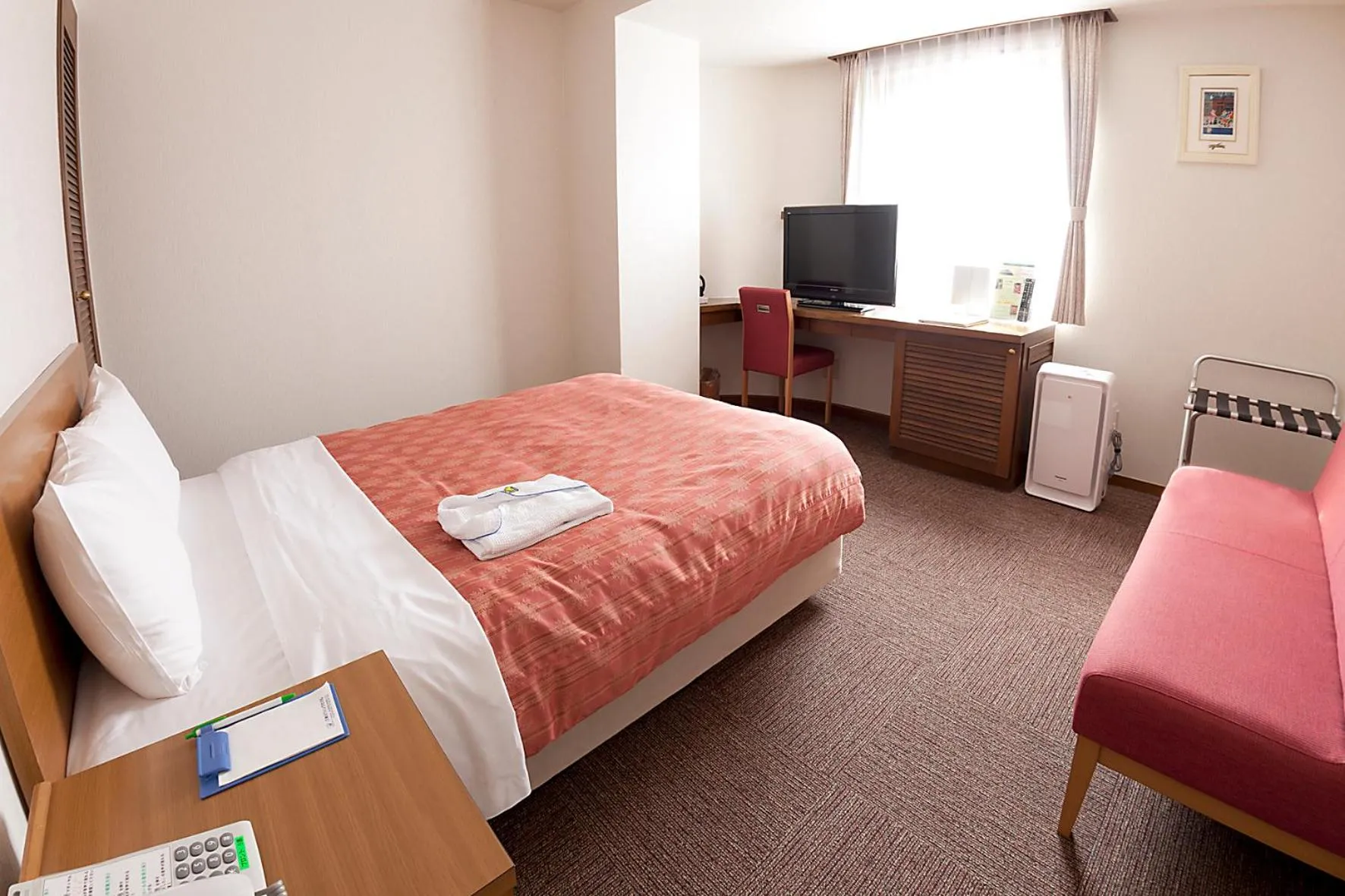 Photo of the whole room, Bed in Kumegawa Wing Hotel