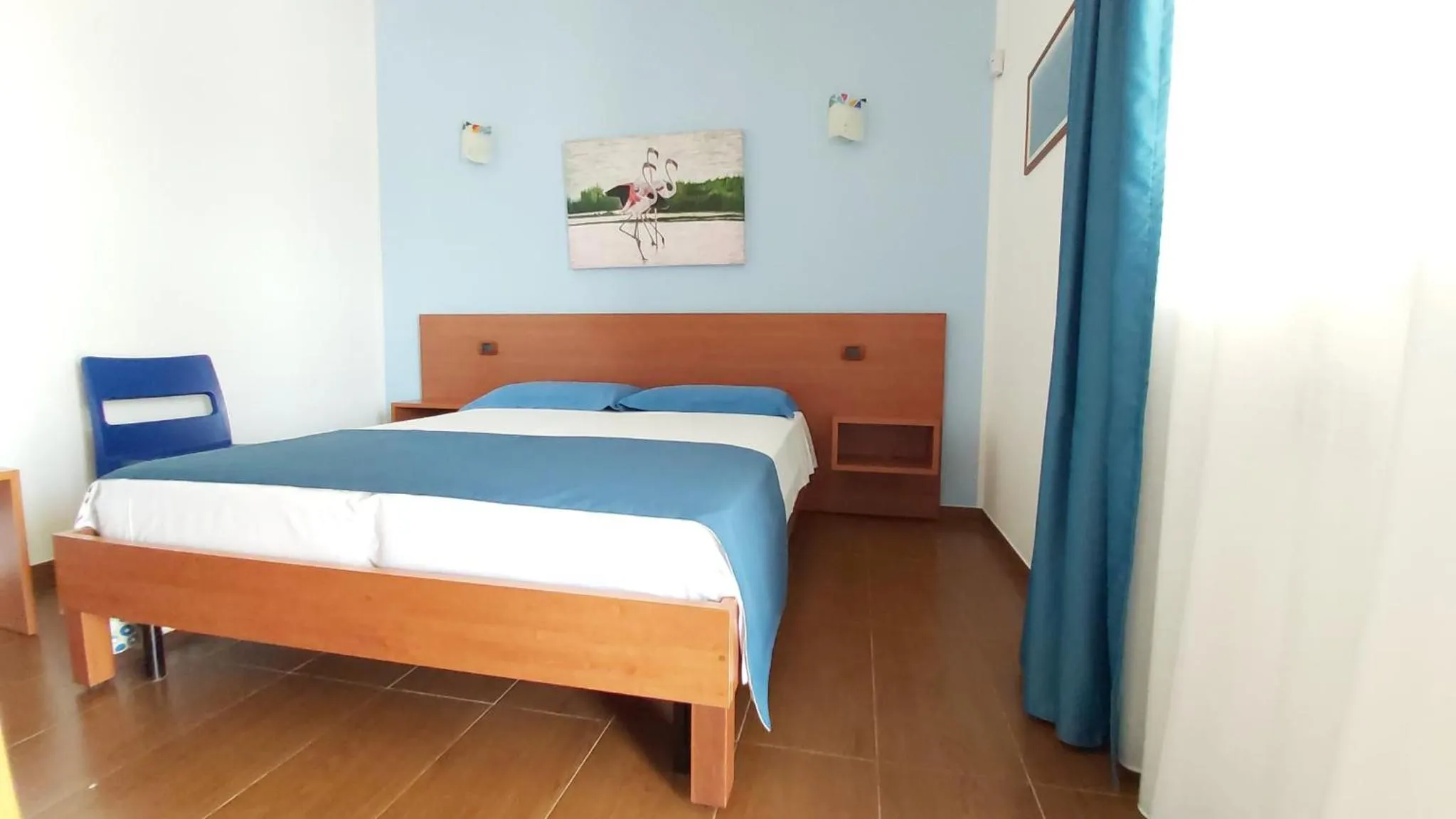 Photo of the whole room, Bed in Residence Bandiera Gialla