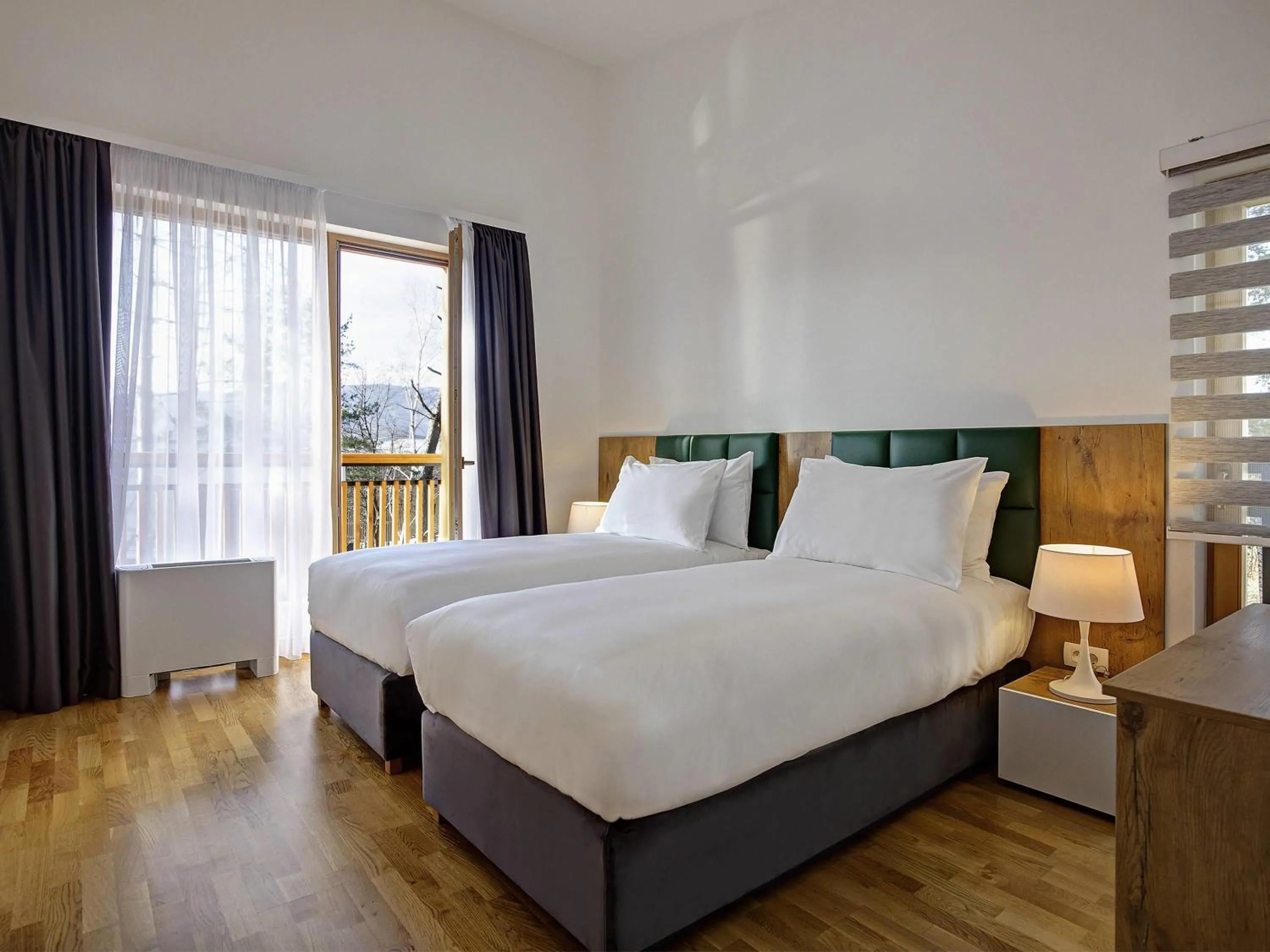 Bedroom, Bed in Tarcin Forest Resort & Spa Sarajevo - MGallery Collection