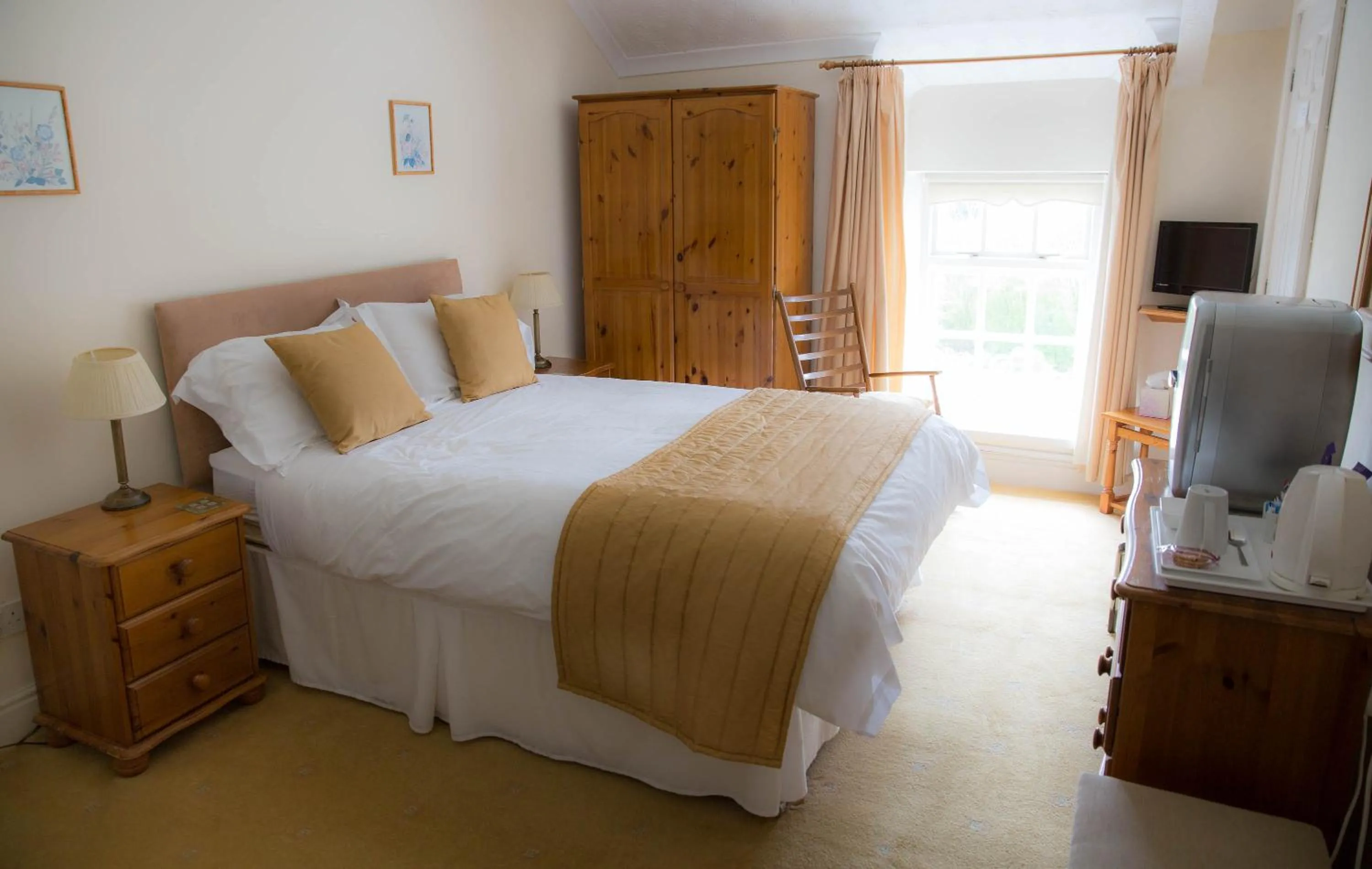 Bed in Llwyn Onn Guest House