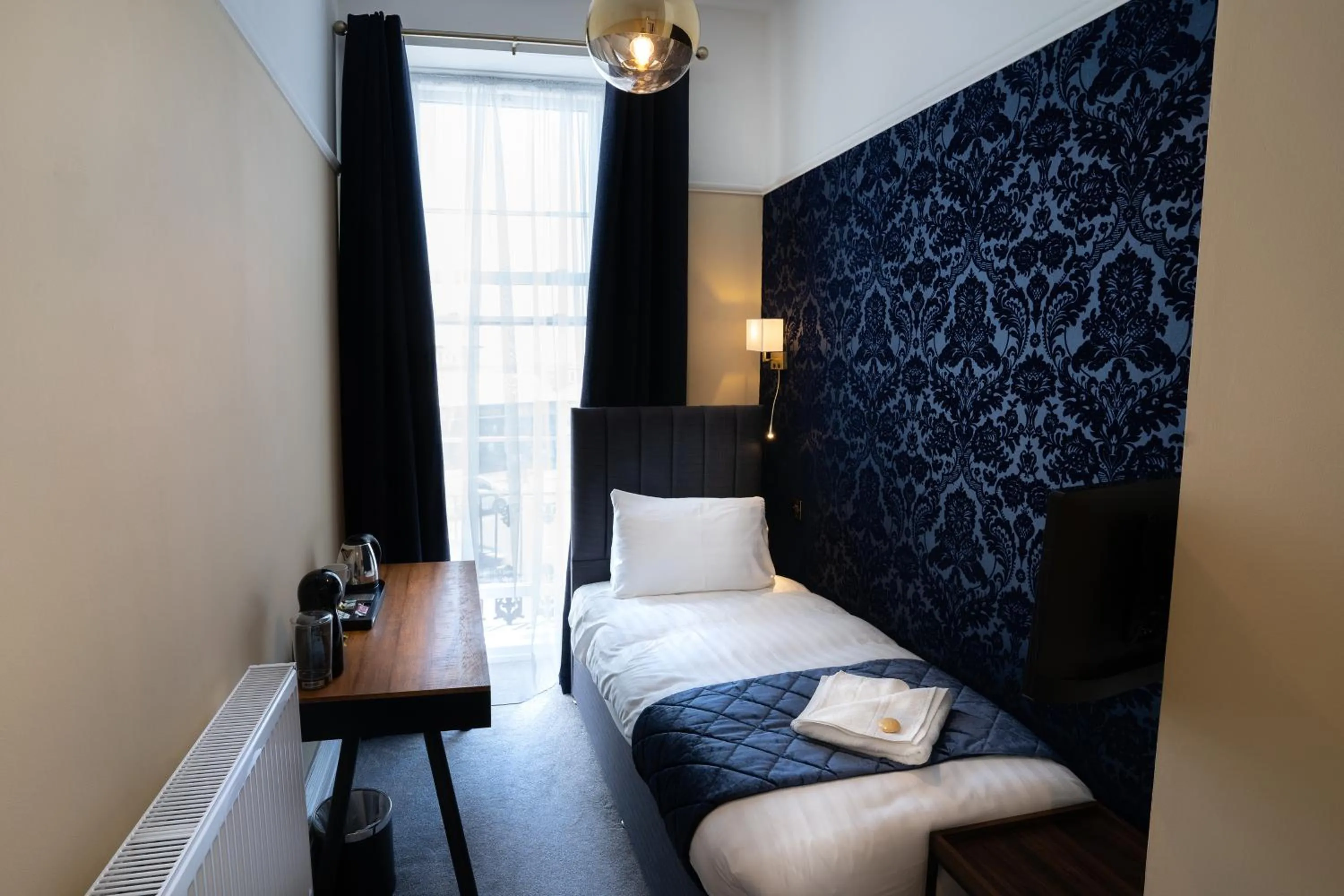 Bed in The Pier Hotel