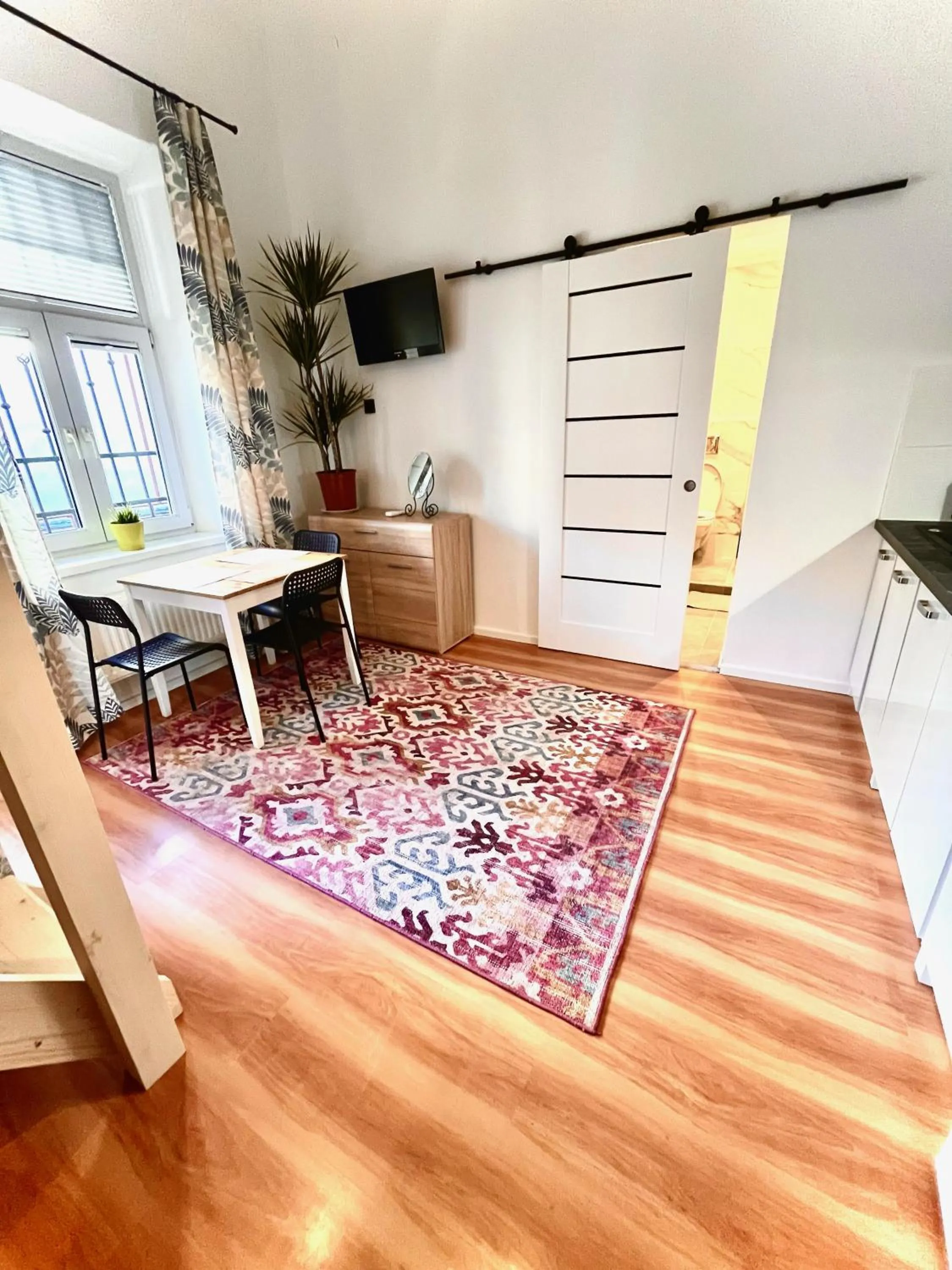 Communal lounge/ TV room in Pokoje Gościnne Wiślna