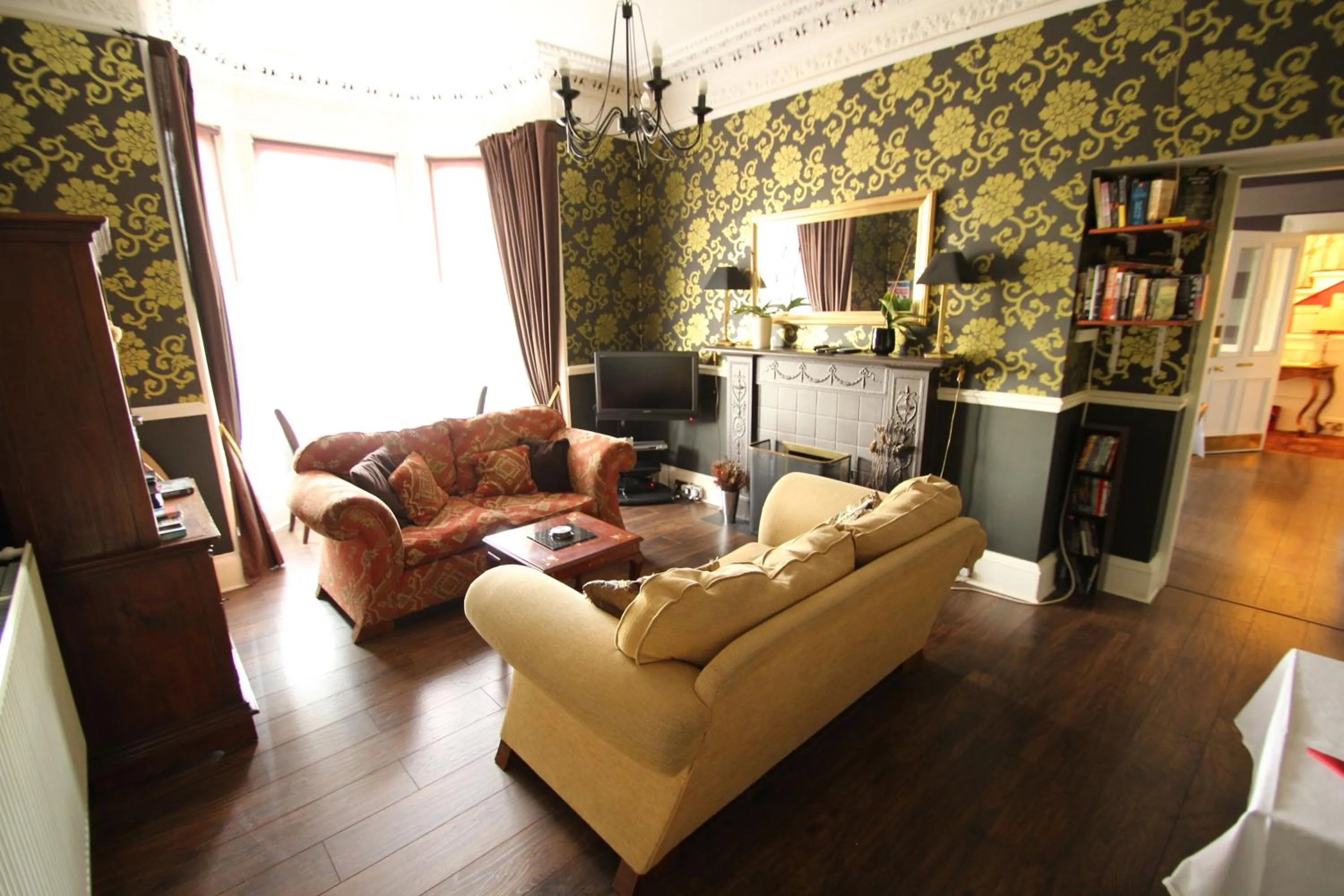 Communal lounge/ TV room in The Sandaig