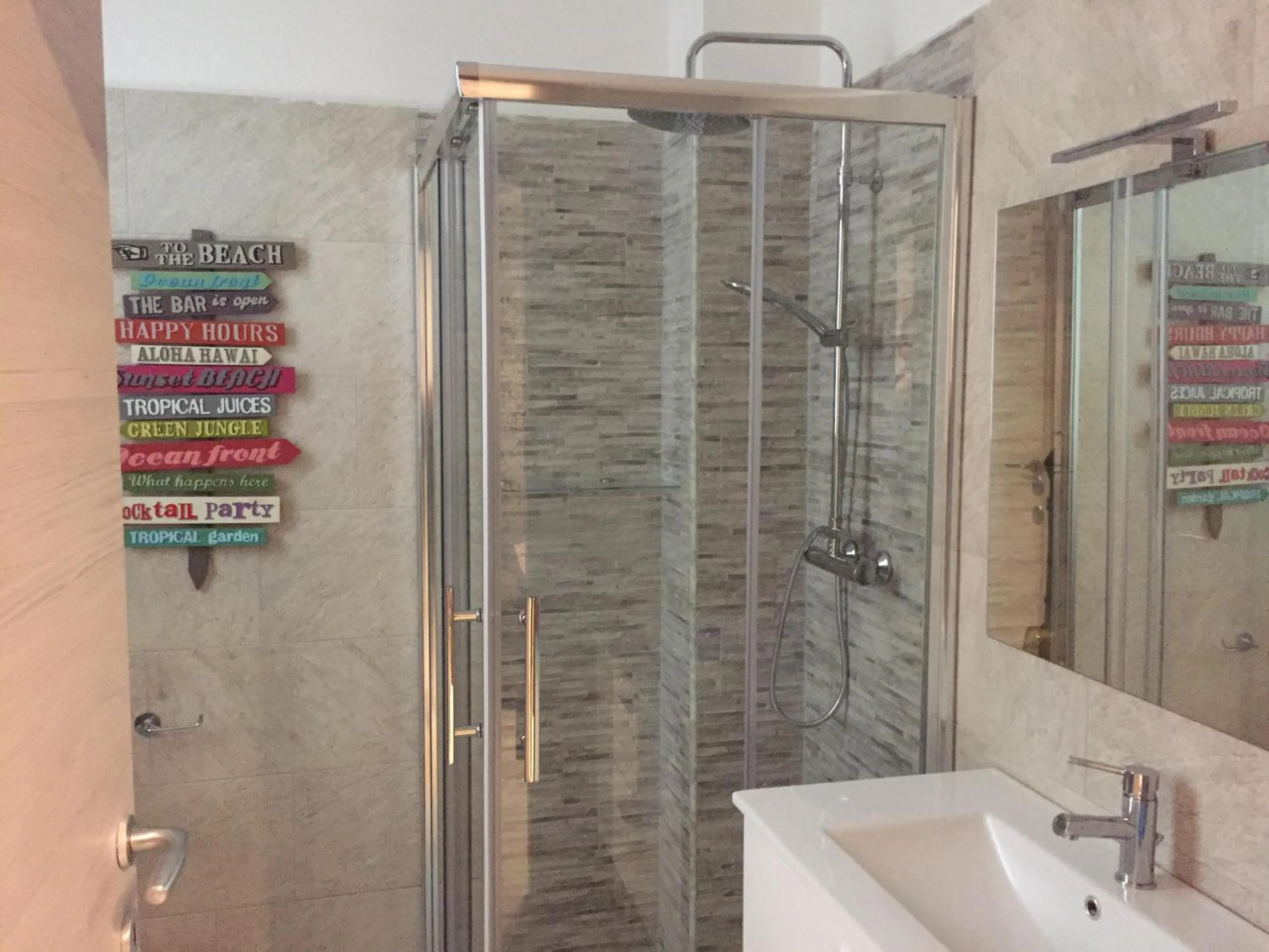 Bathroom in Murena Apartments & rooms