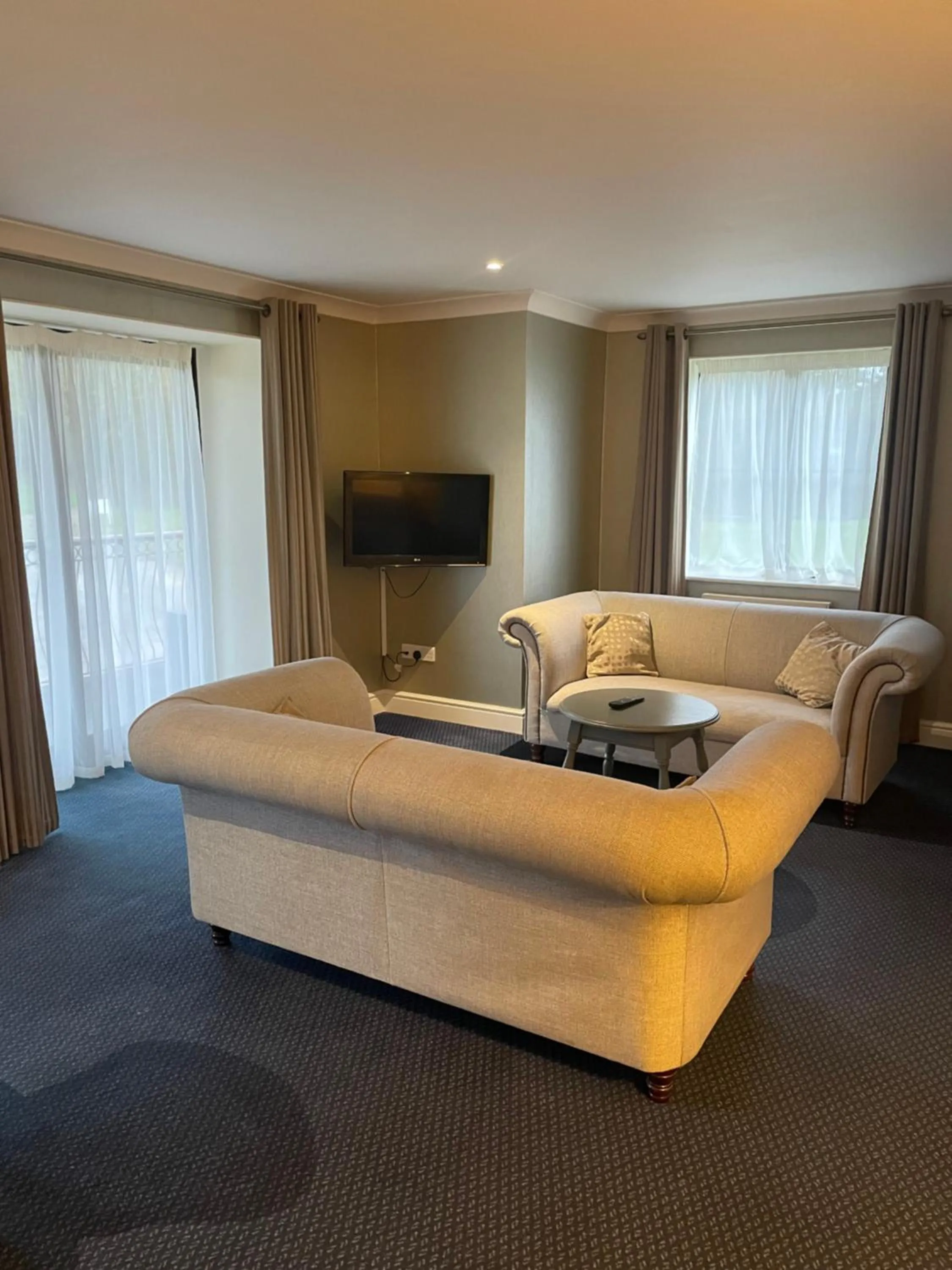 Living room in Woodbury Park Hotel & Spa