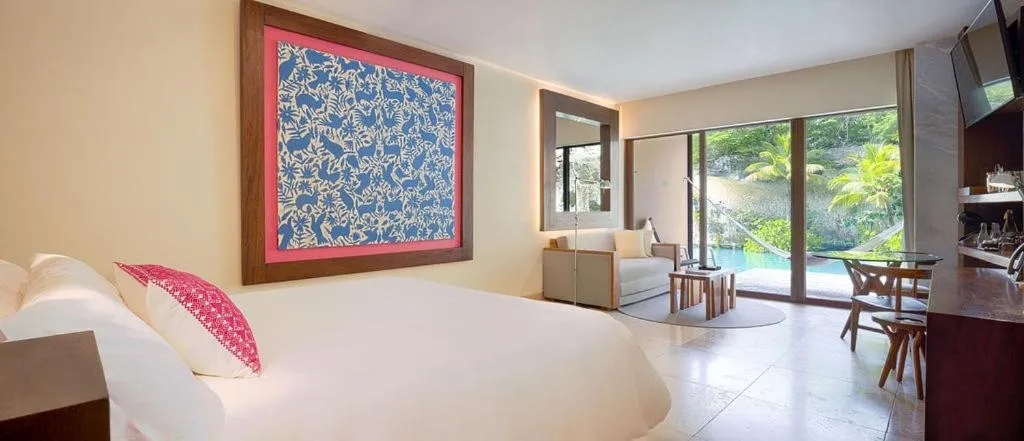 Photo of the whole room, Bed in Hotel Xcaret Mexico All Parks All Fun Inclusive