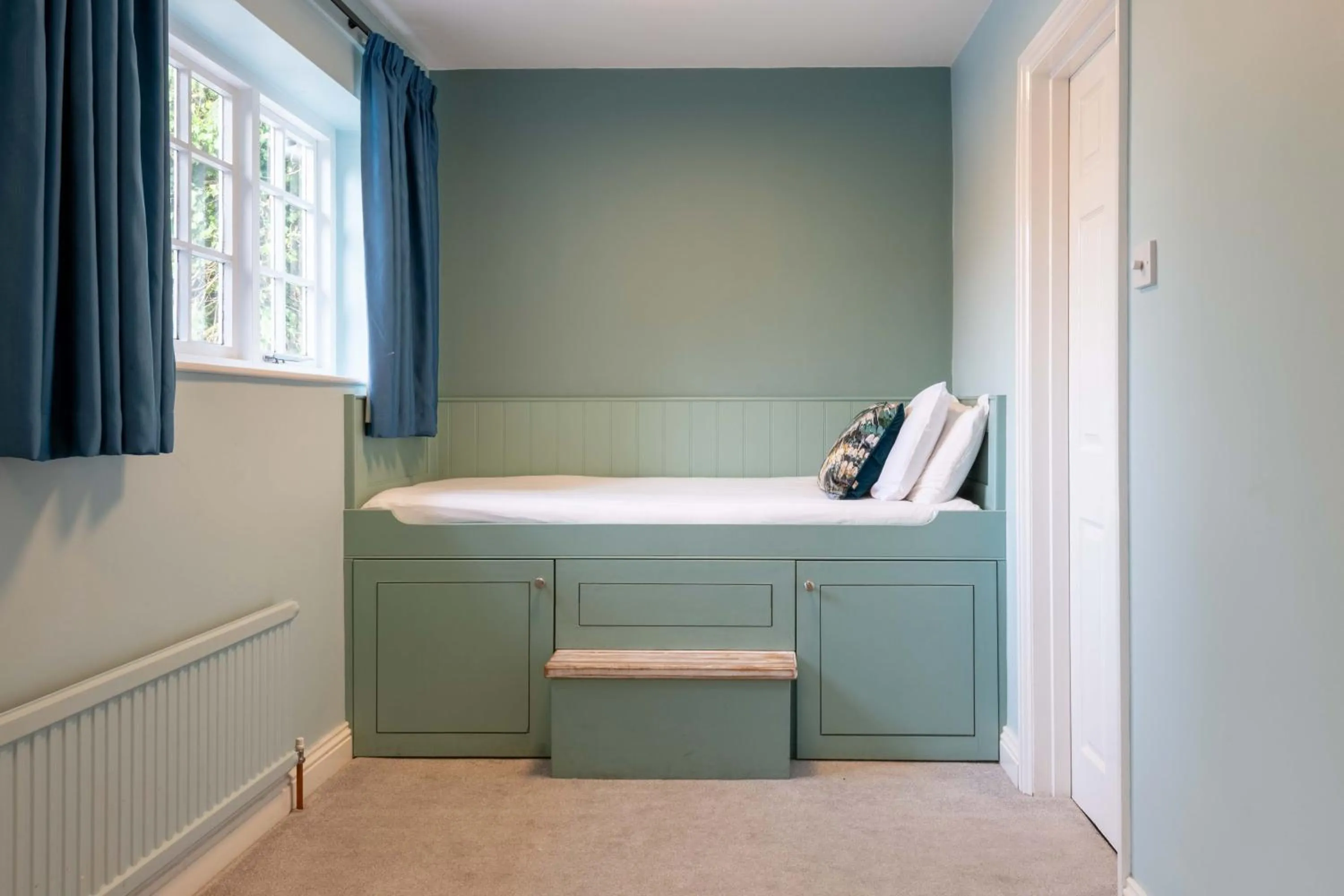 Bed in Wisteria Hotel