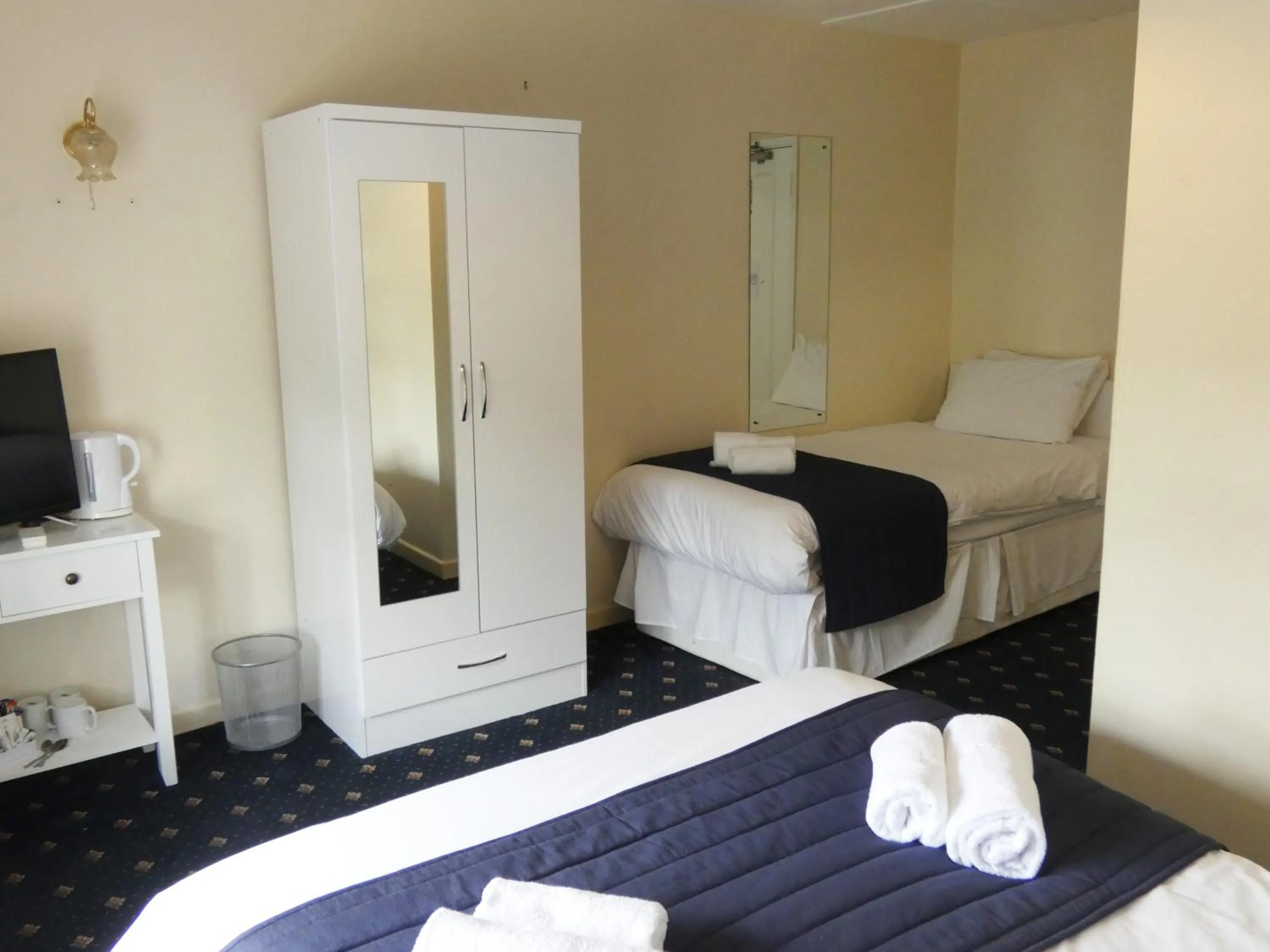 Bedroom in The Riverside Hotel