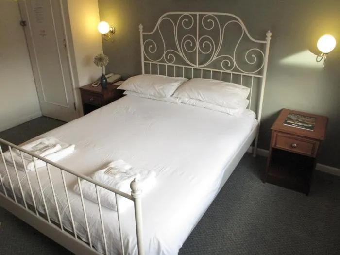 Bedroom in The Riverside Hotel