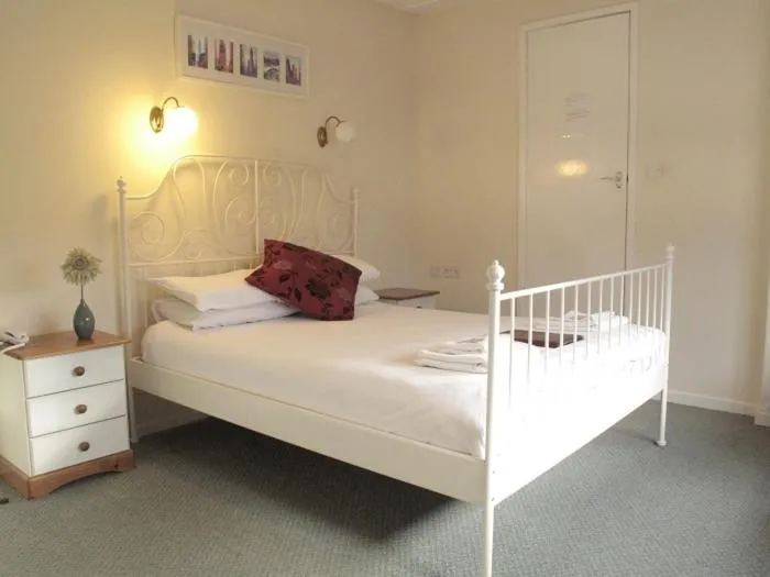 Bedroom in The Riverside Hotel