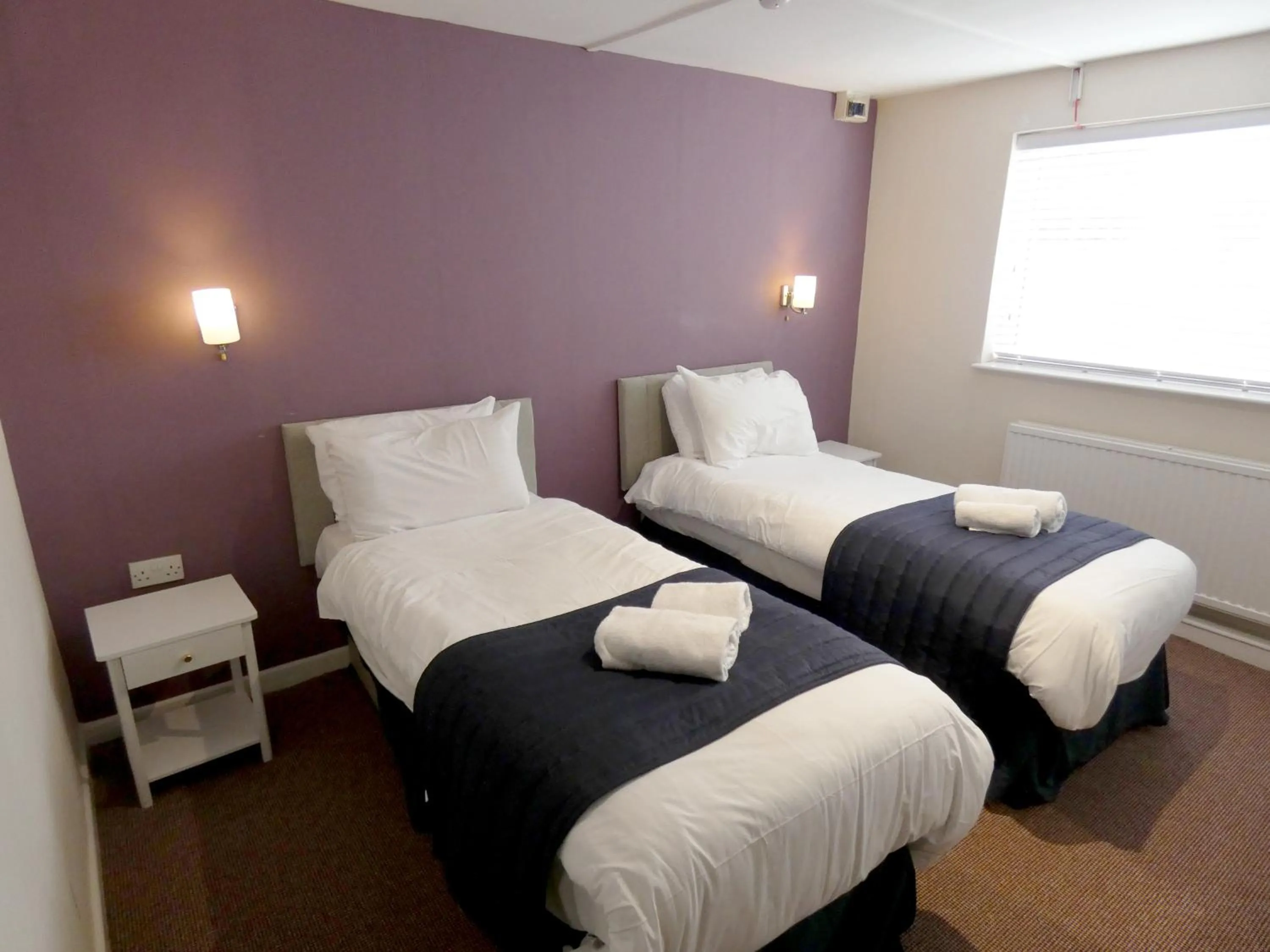 Bedroom in The Riverside Hotel