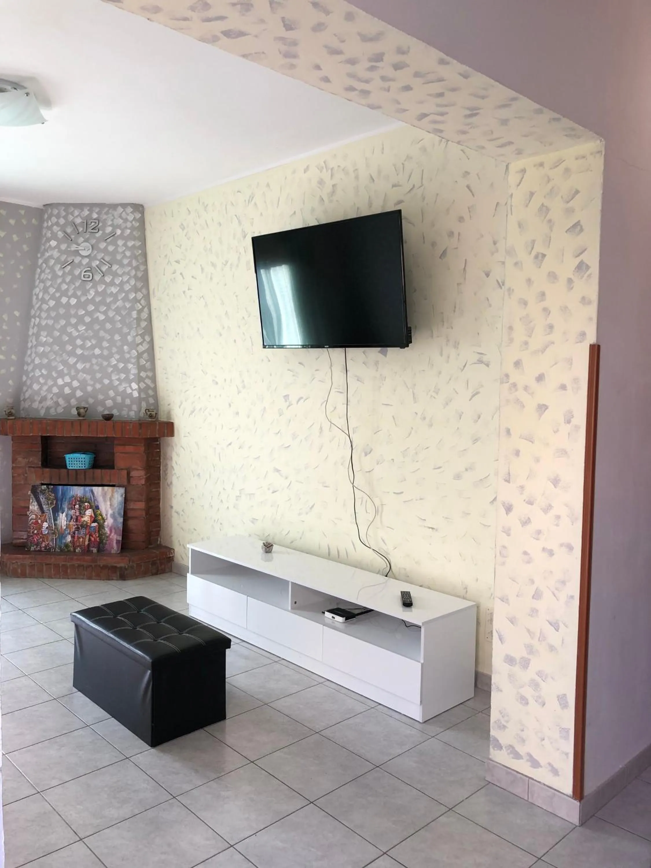 Communal lounge/ TV room in B&B Al Castello