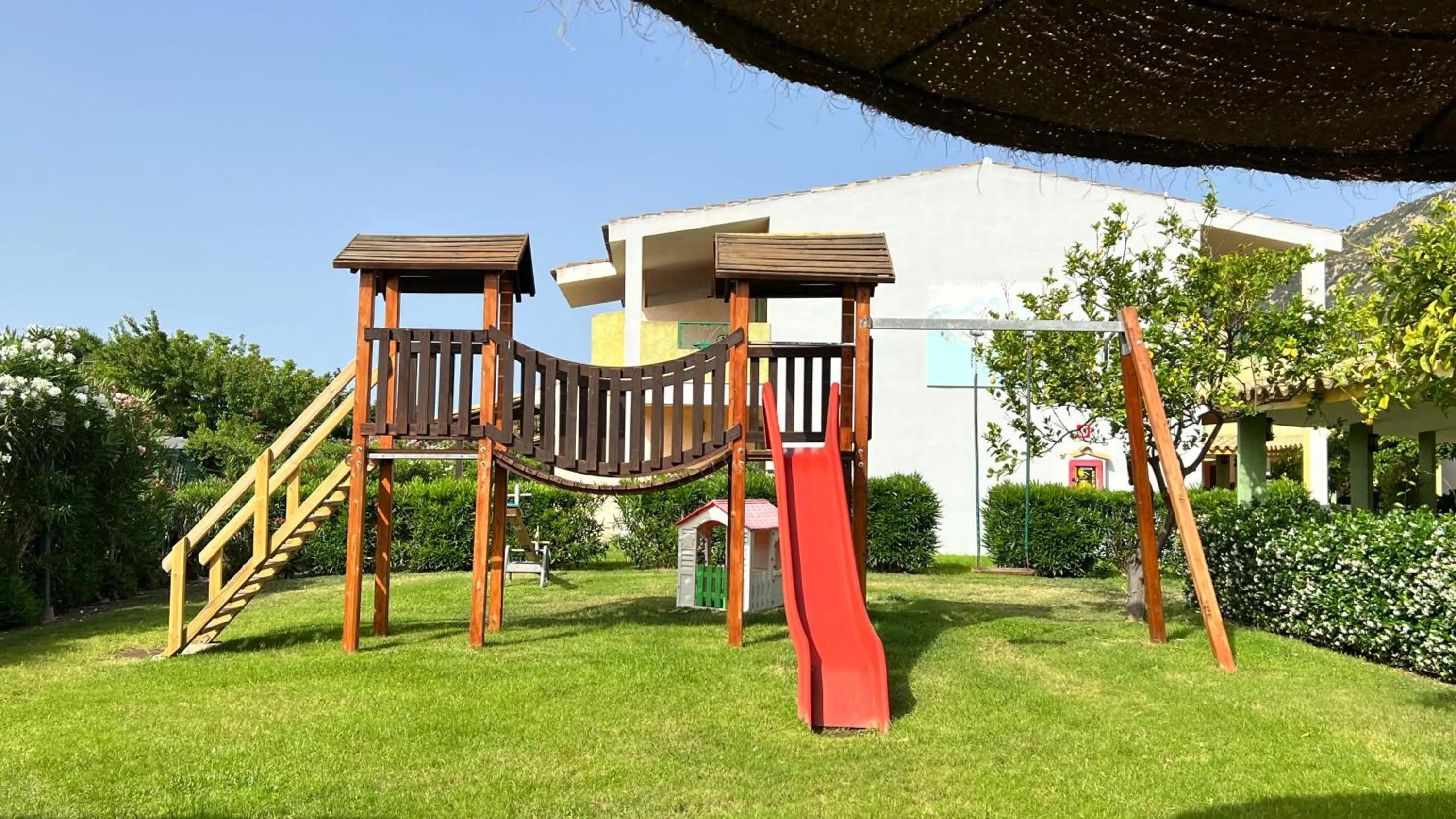 Children play ground in iH Hotels Le Zagare Resort