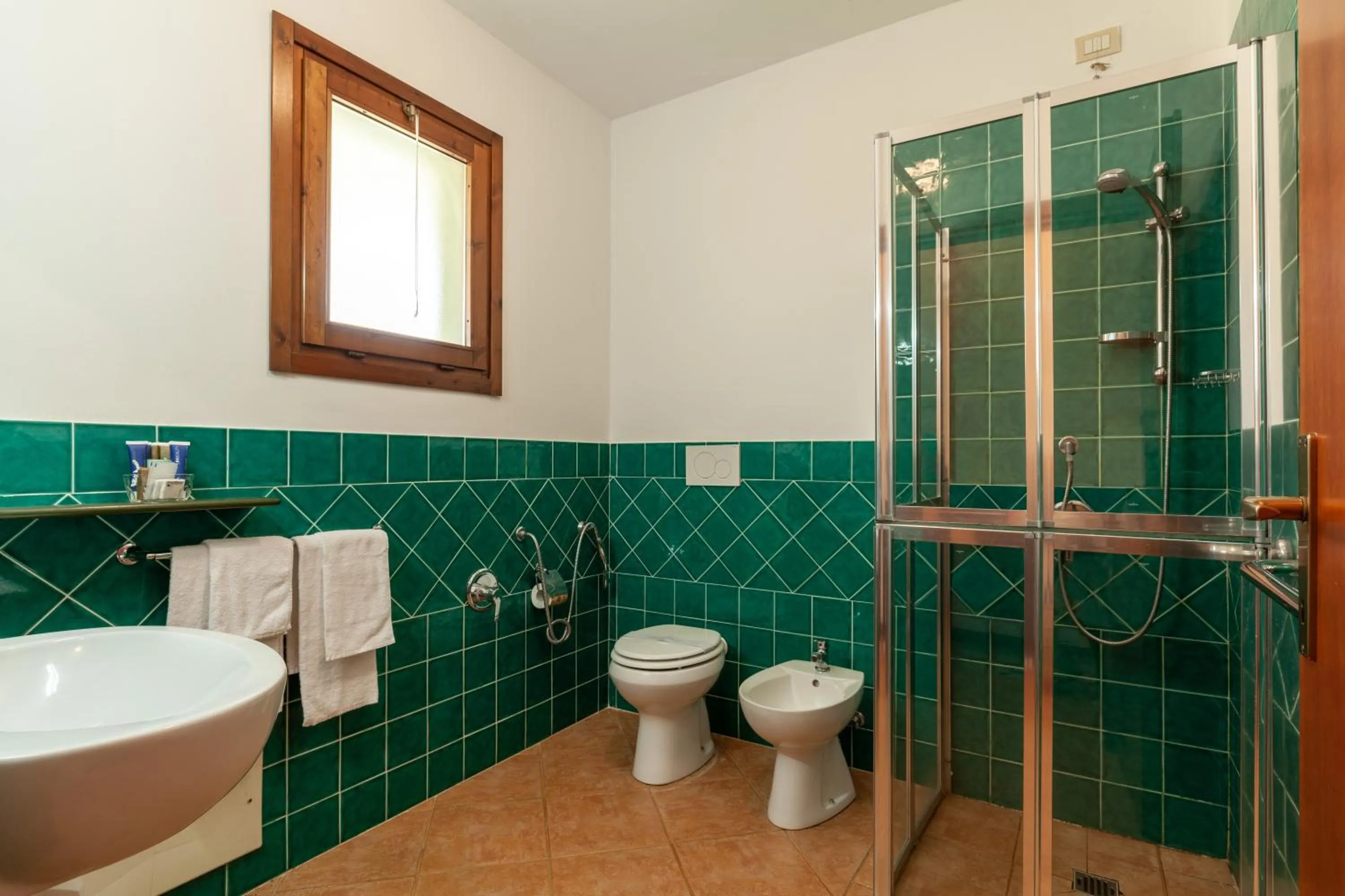 Bathroom in iH Hotels Le Zagare Resort